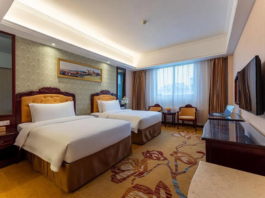 Bed in Vienna Hotel Jingxi Zhongshan Park