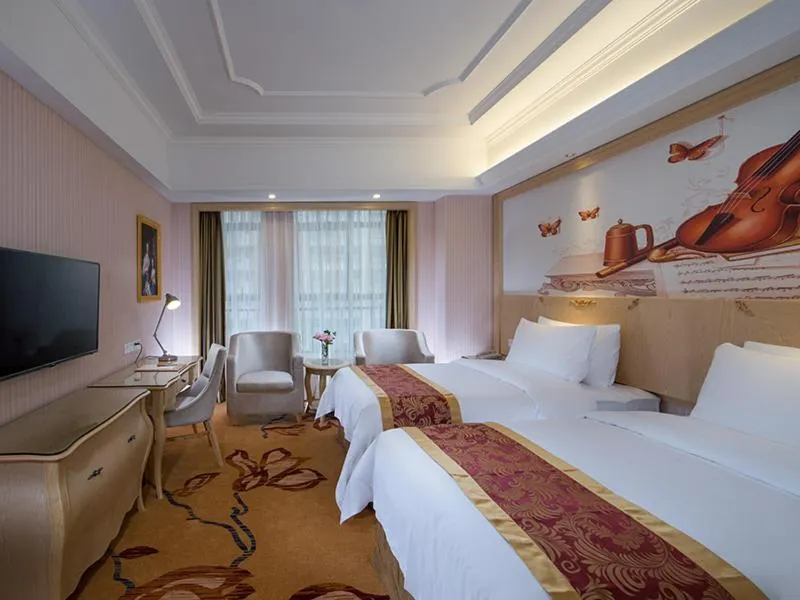 Bed in Vienna International Hotel Dongguan Shilonghuixing Business Central