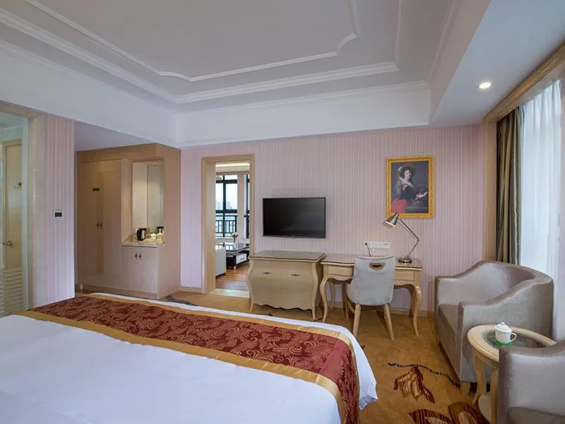 Bed in Vienna International Hotel Dongguan Shilonghuixing Business Central