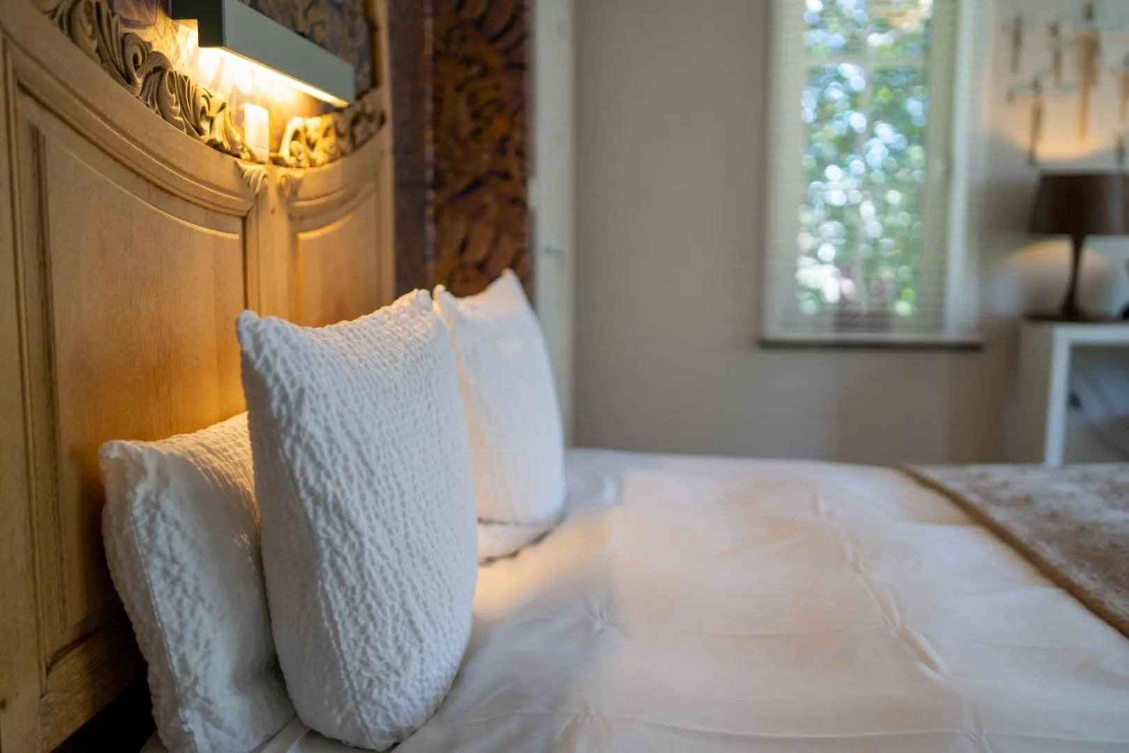 Bed in Hotel Au Nom De Dieu