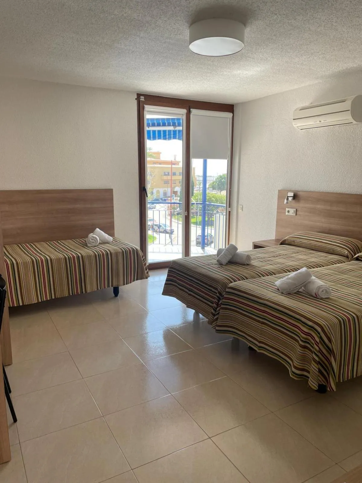 Photo of the whole room, Bed in Hotel Blason Junior