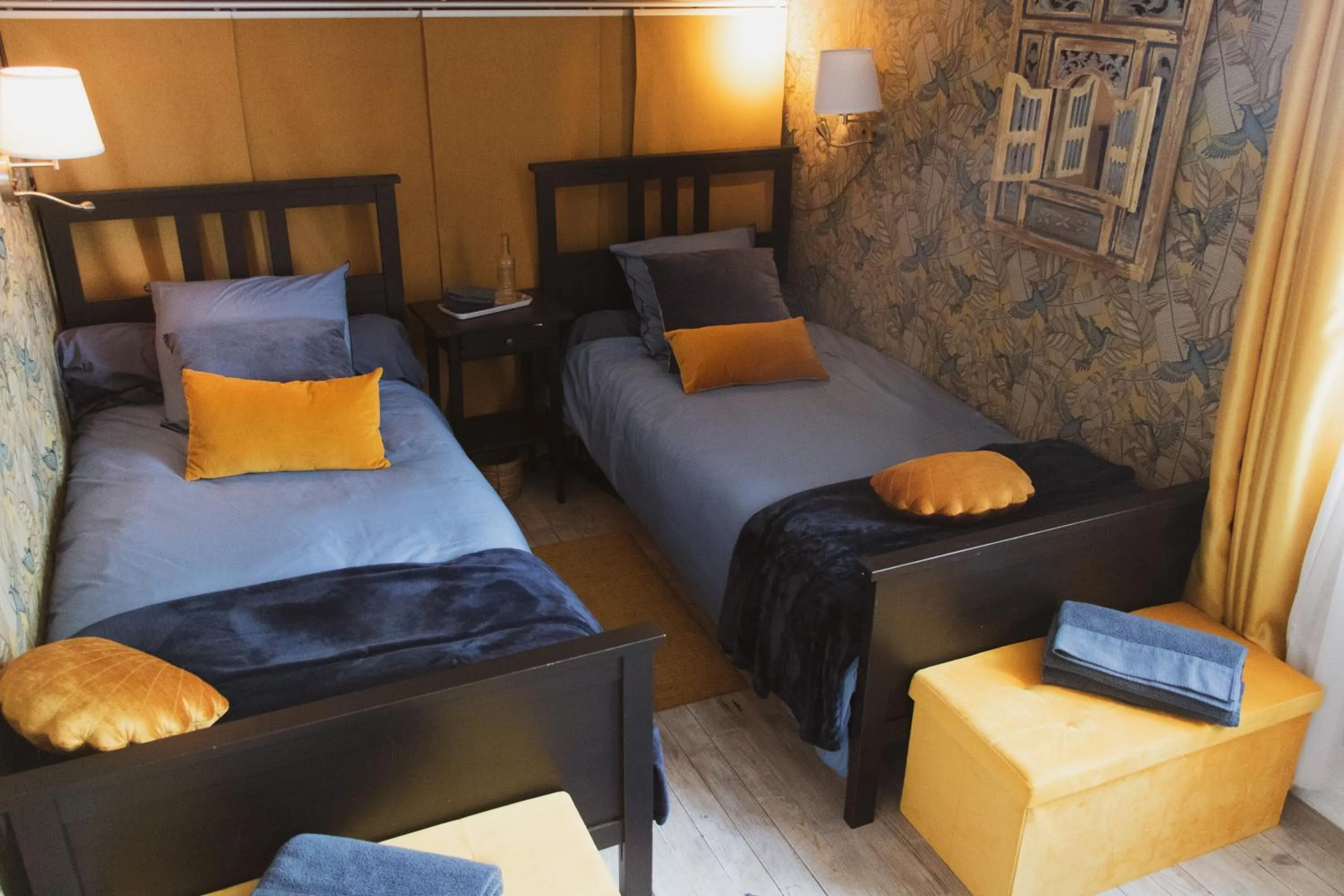 Photo of the whole room, Bed in Au Bien Venu