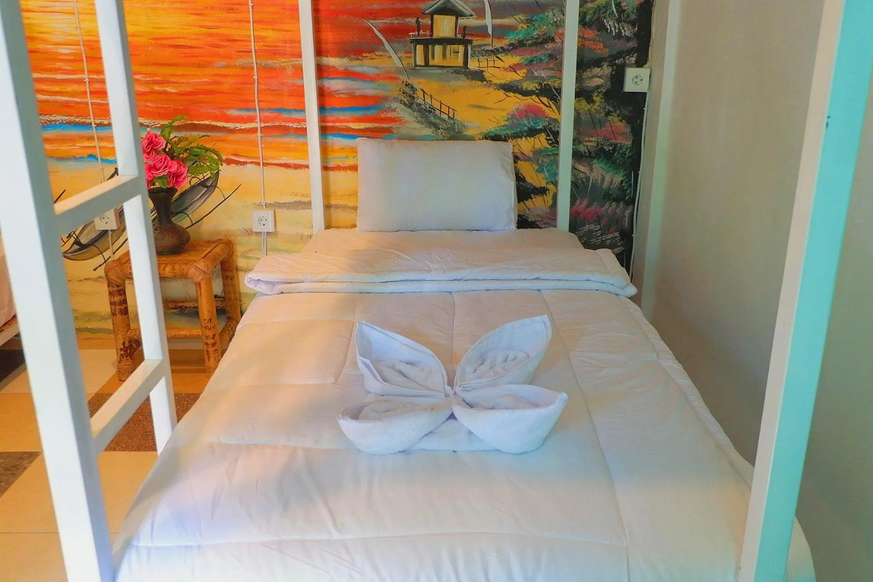 Bed in Tropical Garden Inn