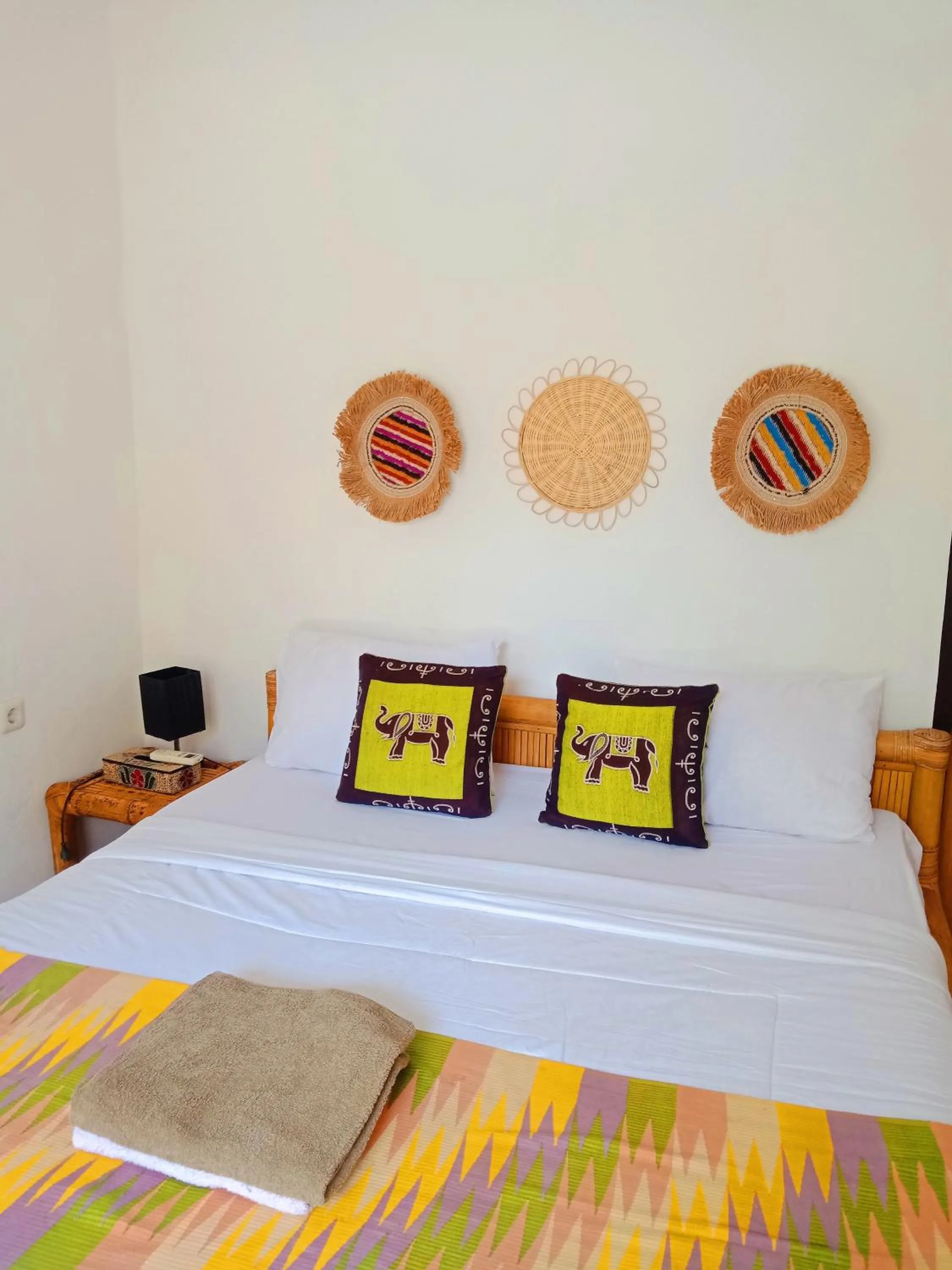 Bed in Tropical Garden Inn