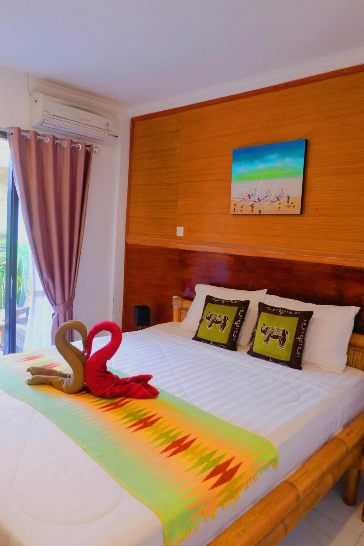 Bed in Tropical Garden Inn