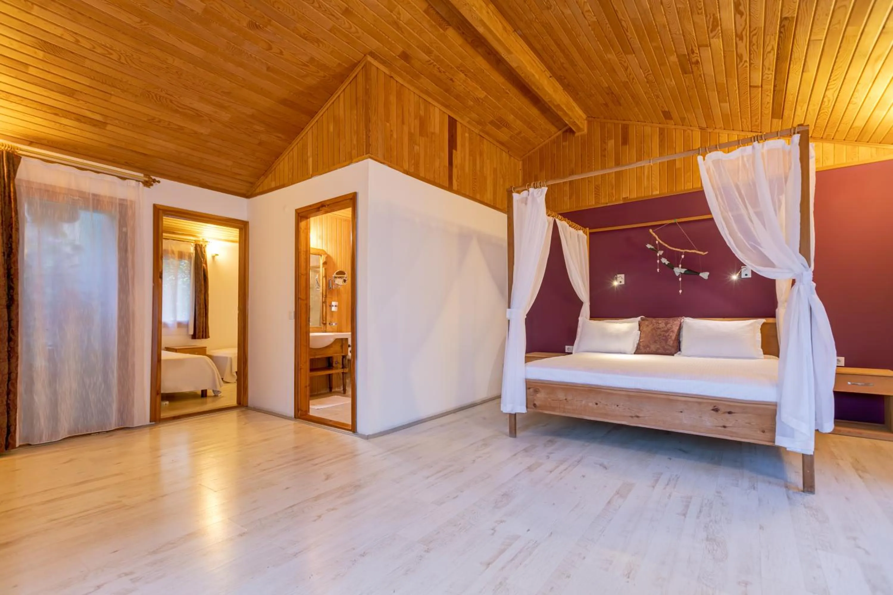 Bed in Etenna Beach Bungalows