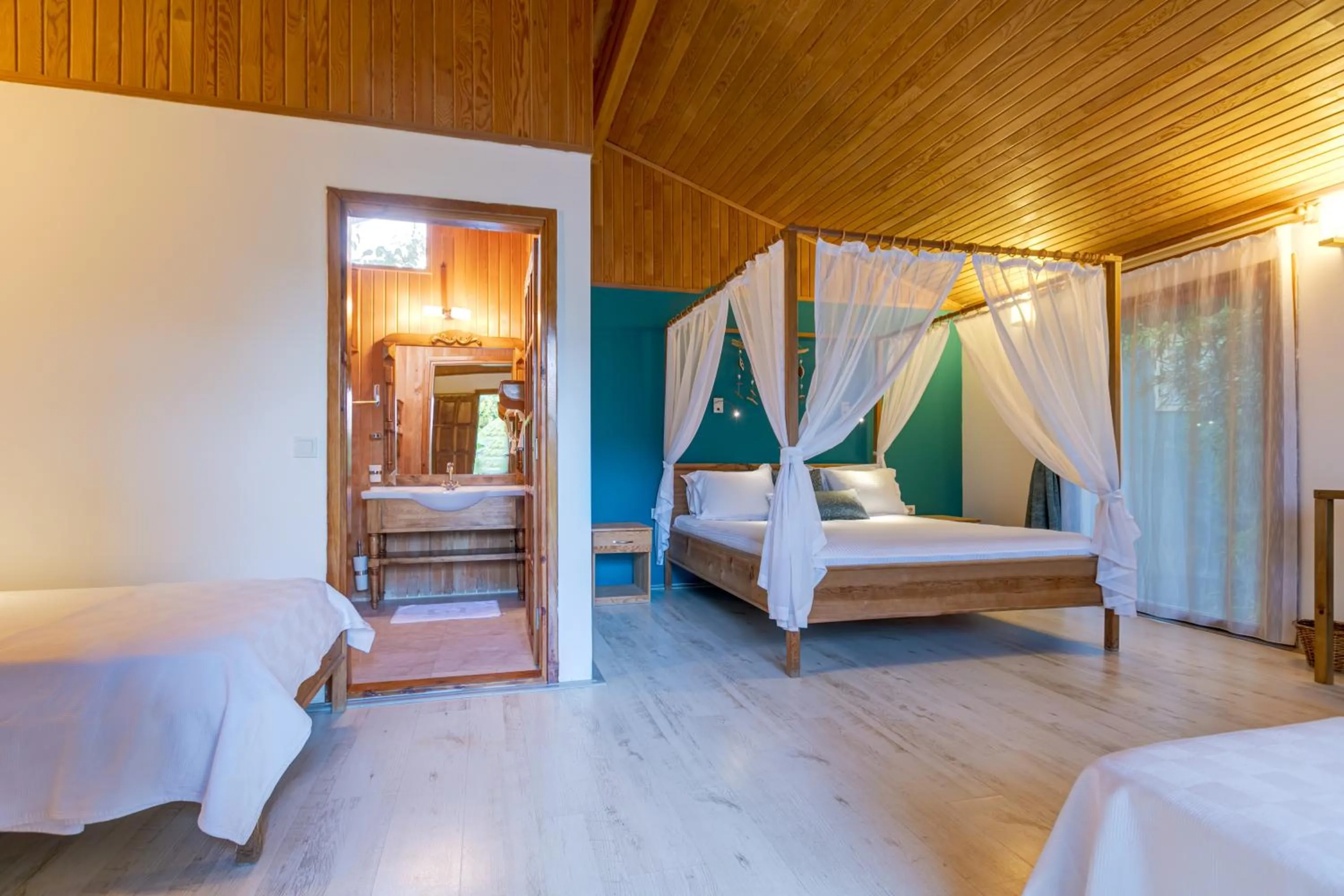 Bed in Etenna Beach Bungalows