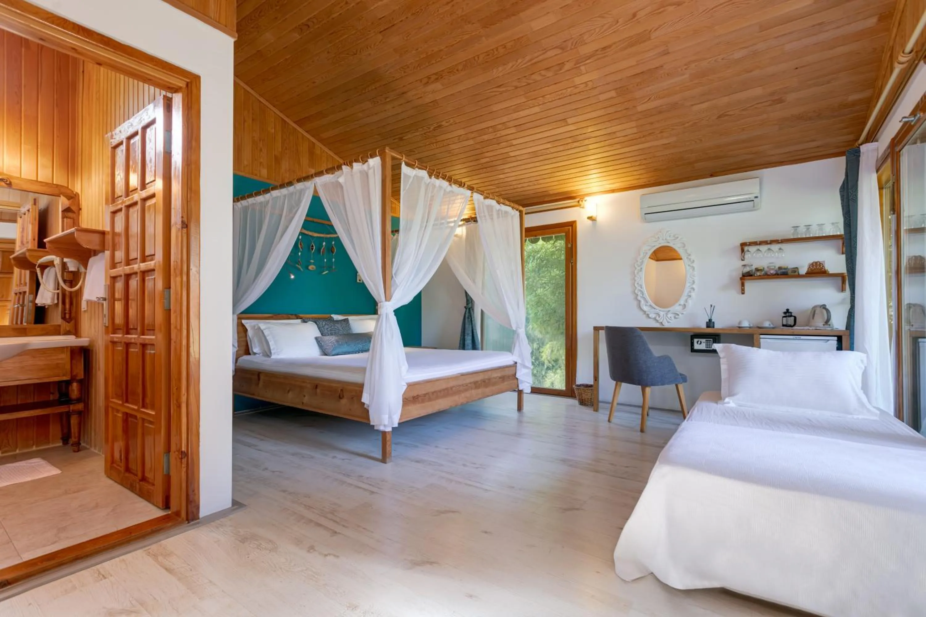 Bed in Etenna Beach Bungalows