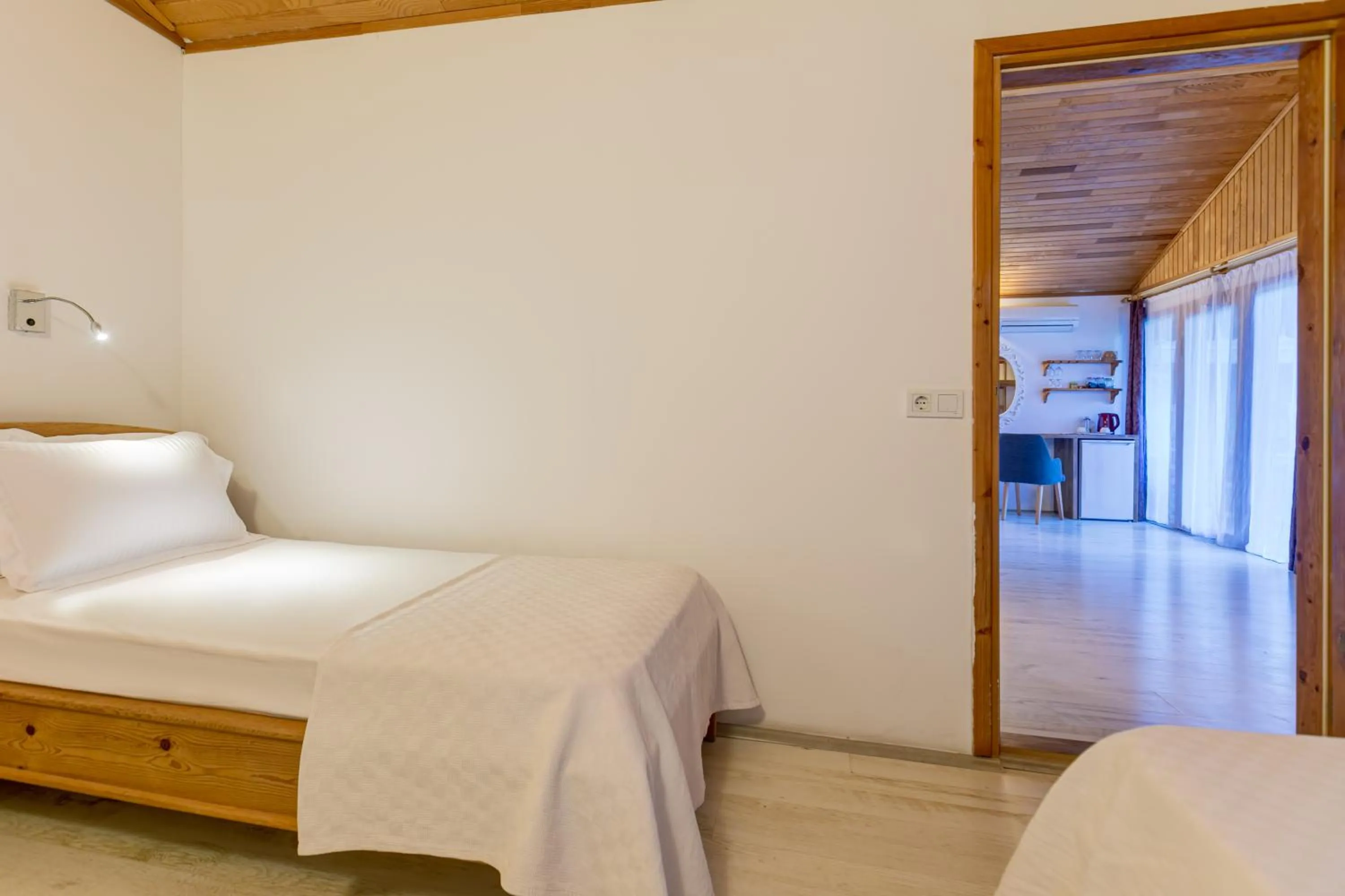 Bed in Etenna Beach Bungalows