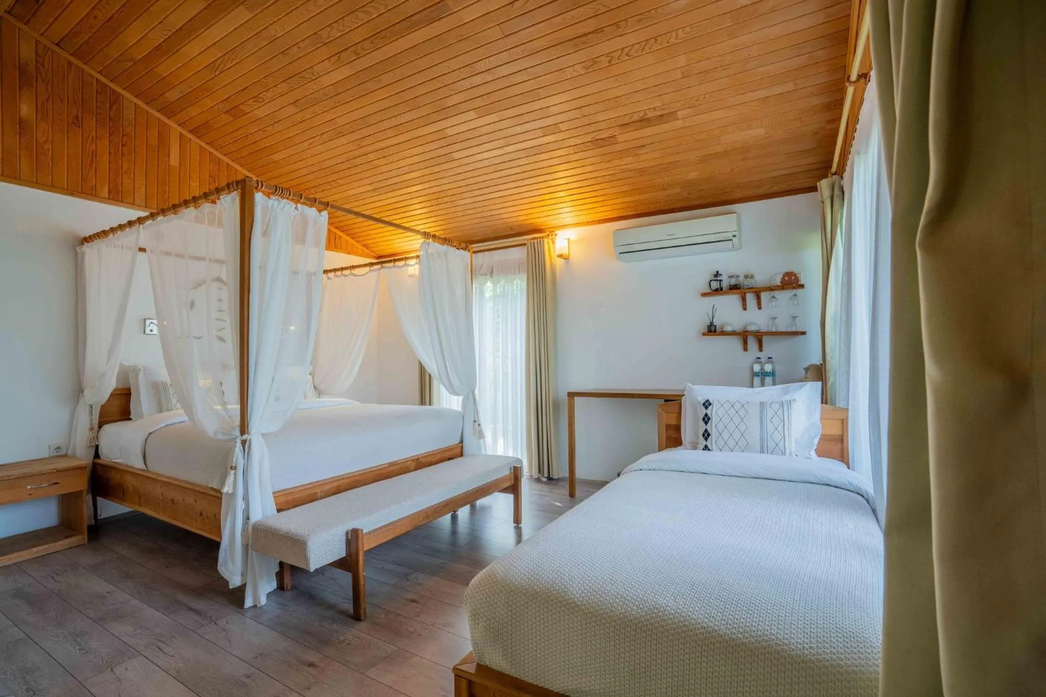 Bed in Etenna Beach Bungalows