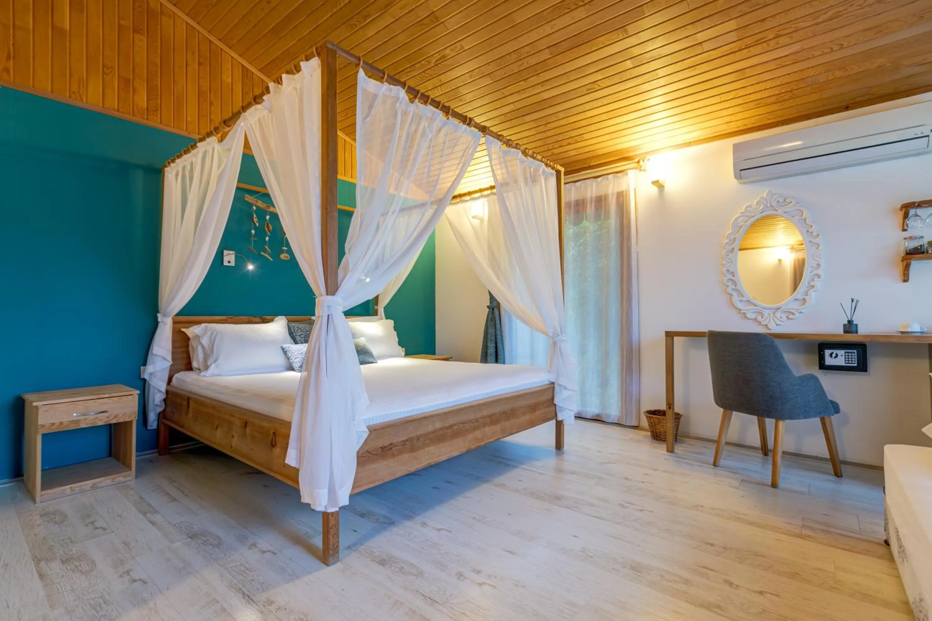 Bed in Etenna Beach Bungalows