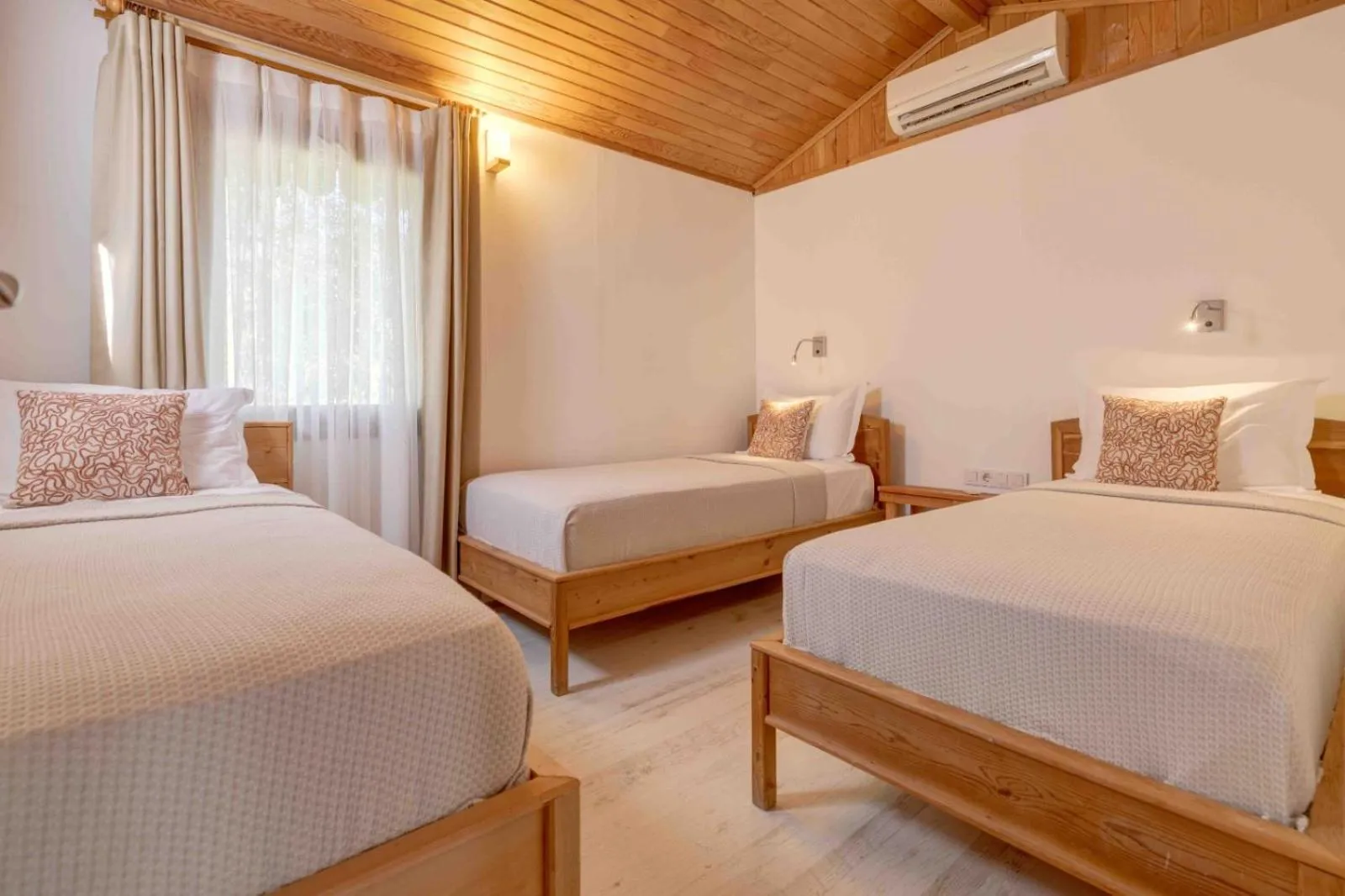 Bed in Etenna Beach Bungalows