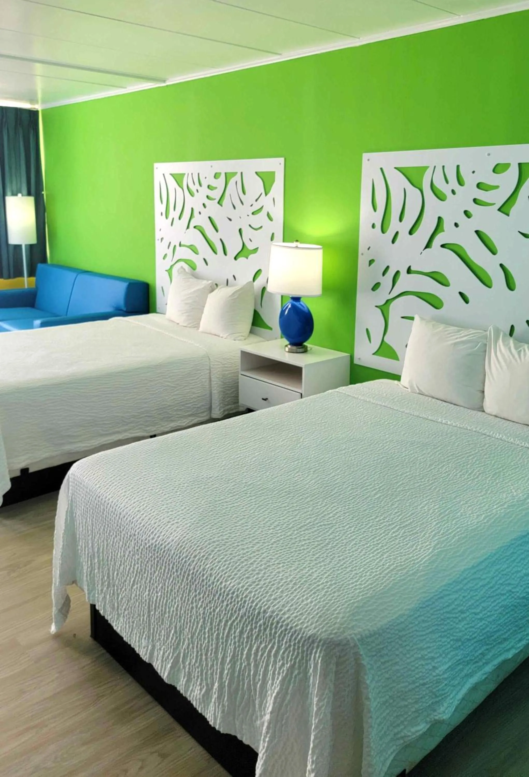 Bed in Kokomo Suites