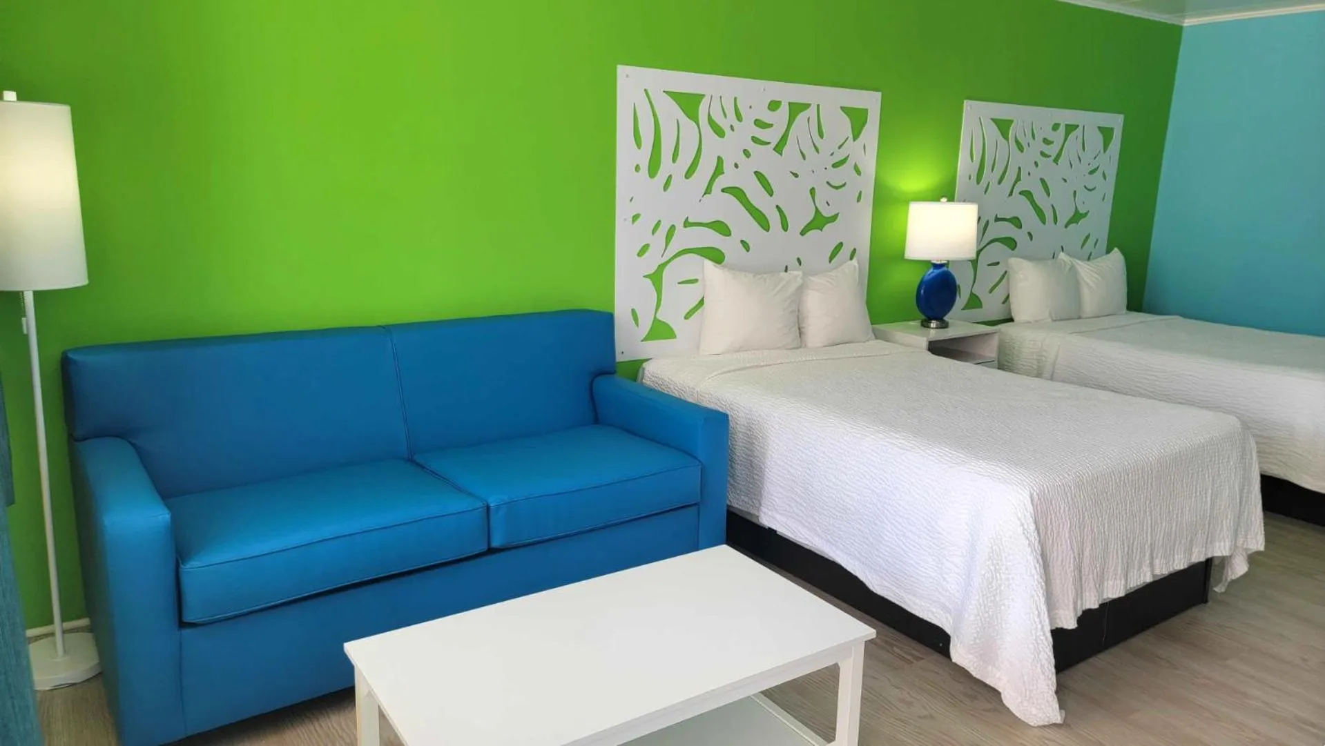 Bed in Kokomo Suites