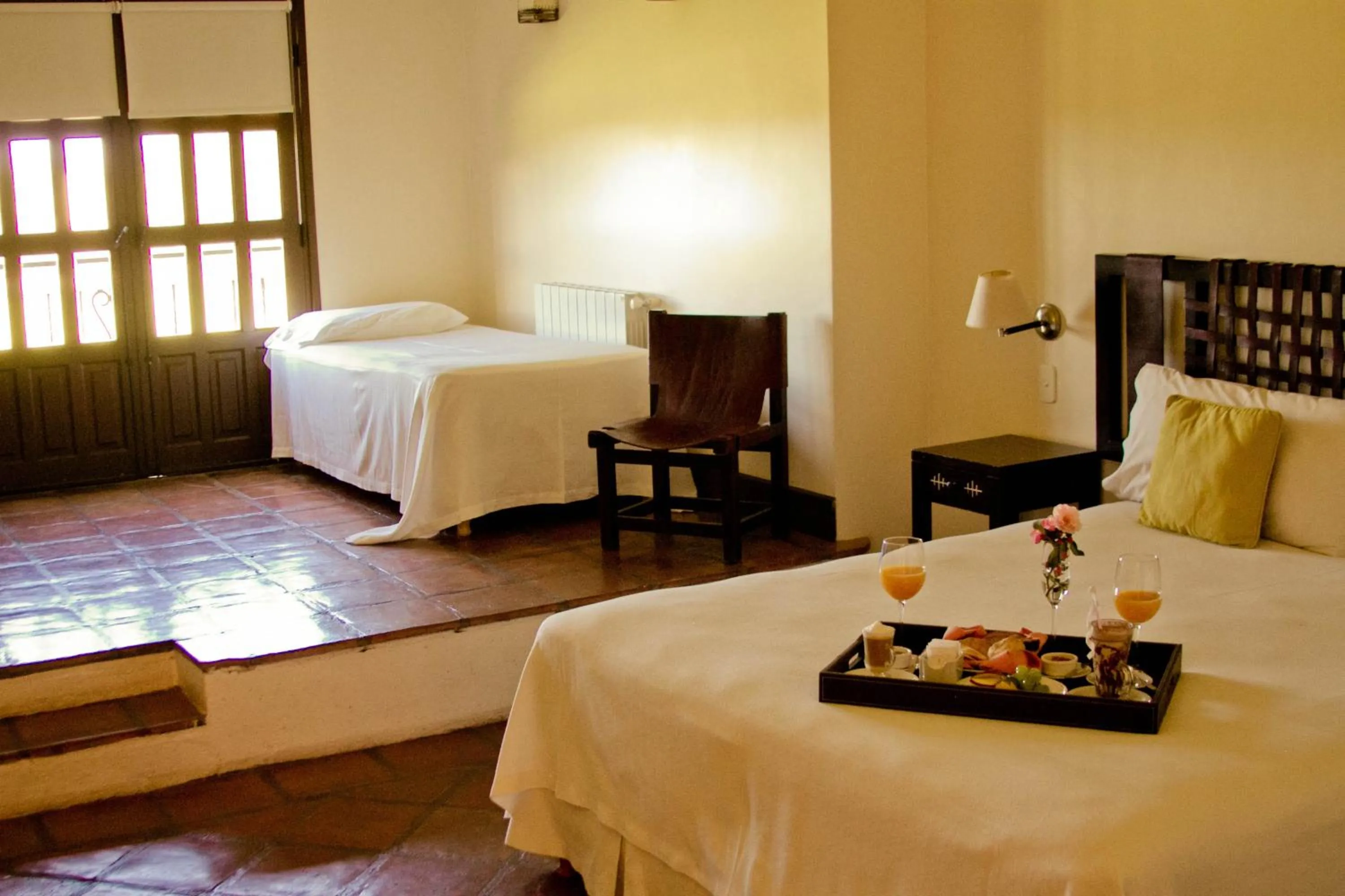 Coffee/tea facilities, Bed in Altalaluna Hotel Boutique & Spa