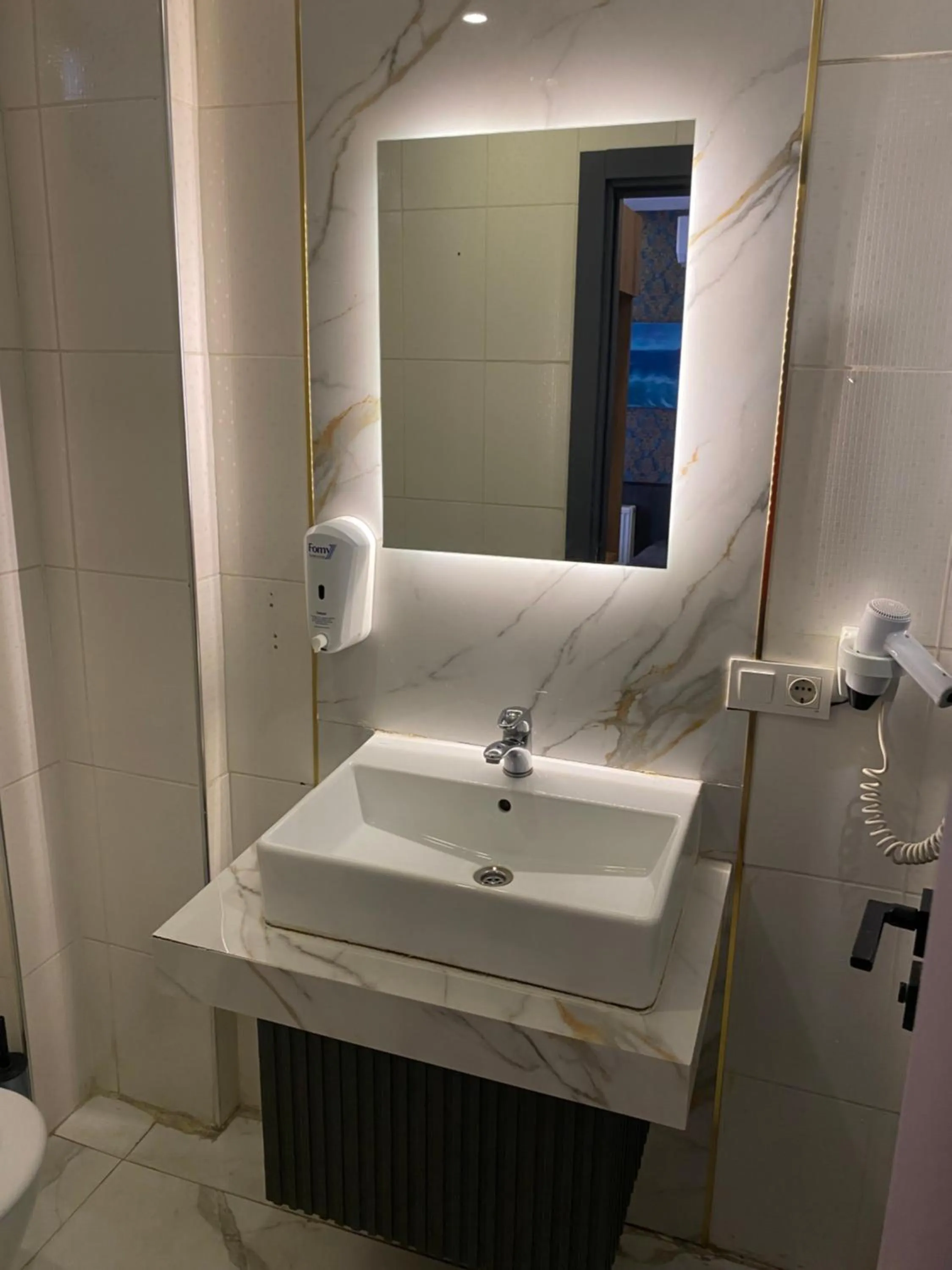 Bathroom in Dolce Vita Suite Hotel