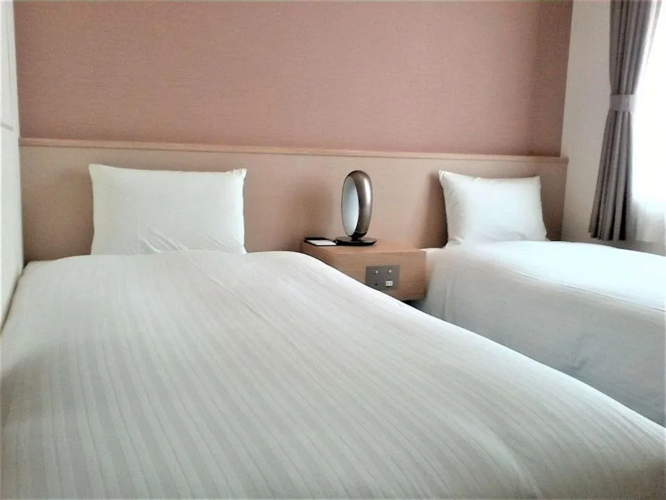 Bed in Bande Hotel Osaka