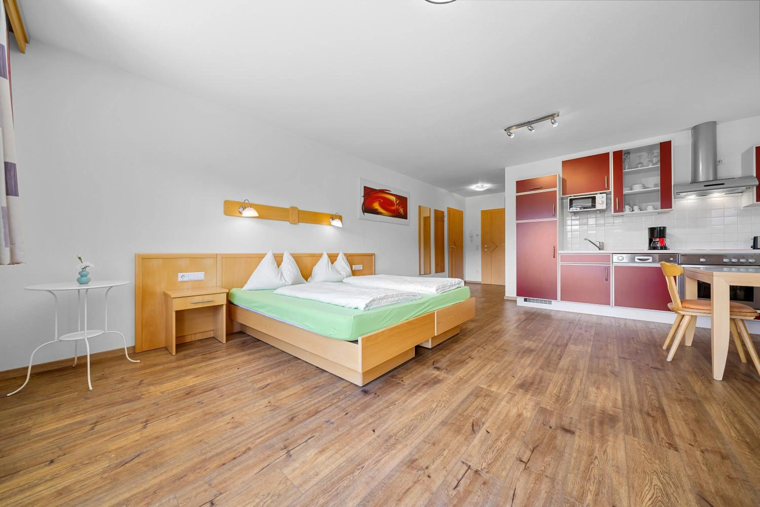 Kitchen or kitchenette, Bed in Aparthotel Sunrise