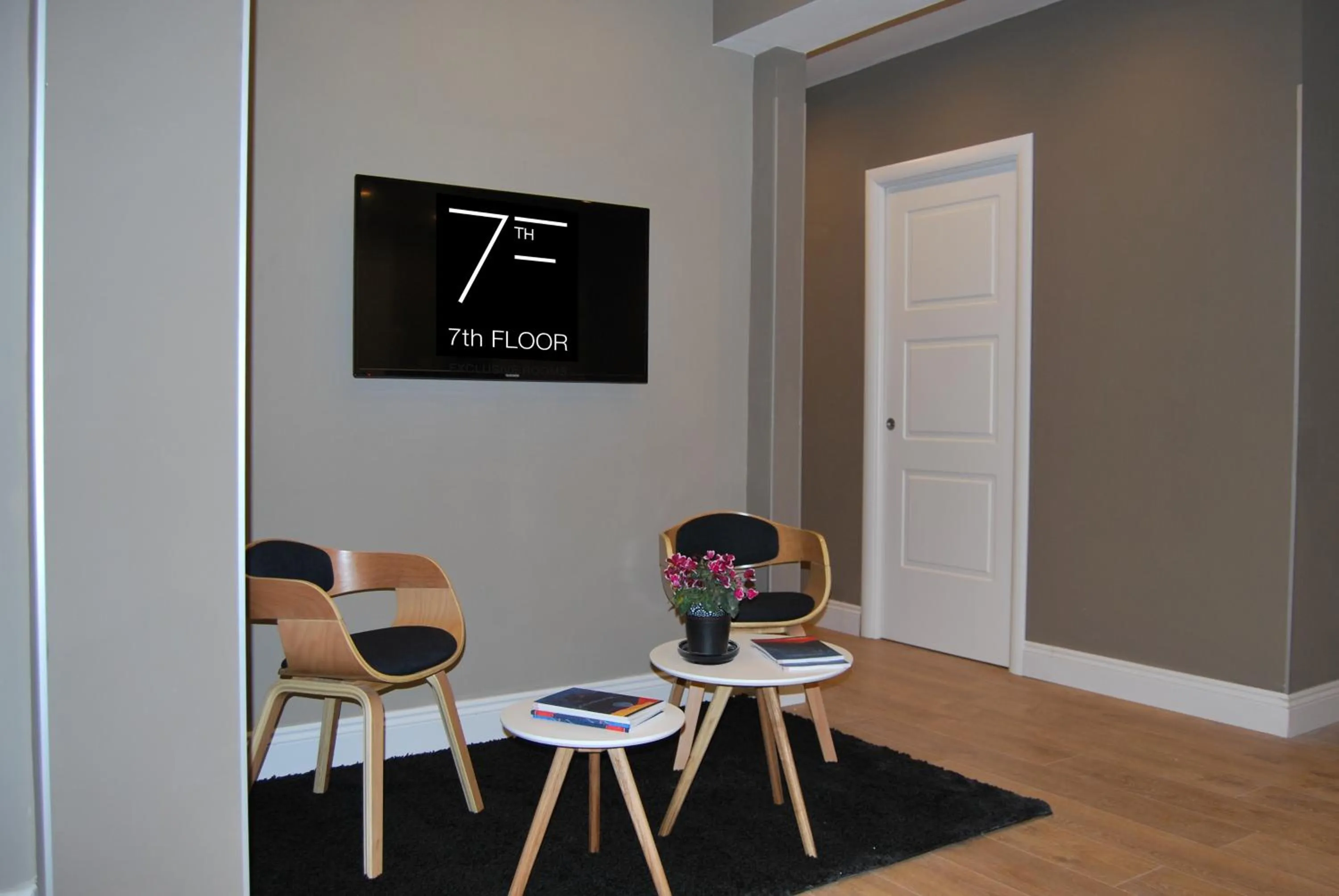 Communal lounge/ TV room in 7th Floor Suite