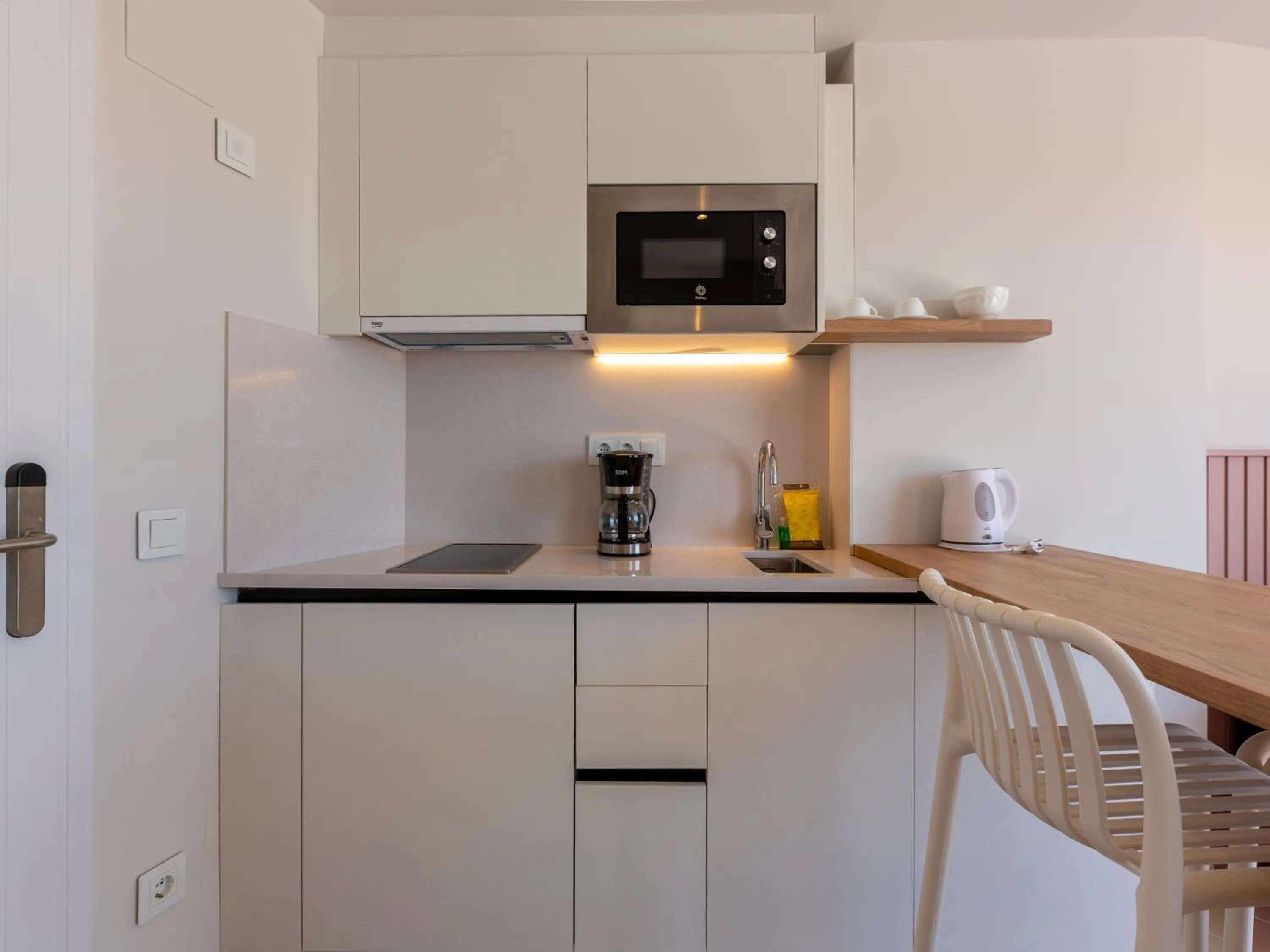 Kitchen or kitchenette in Apartamentos Sunway Atlanta