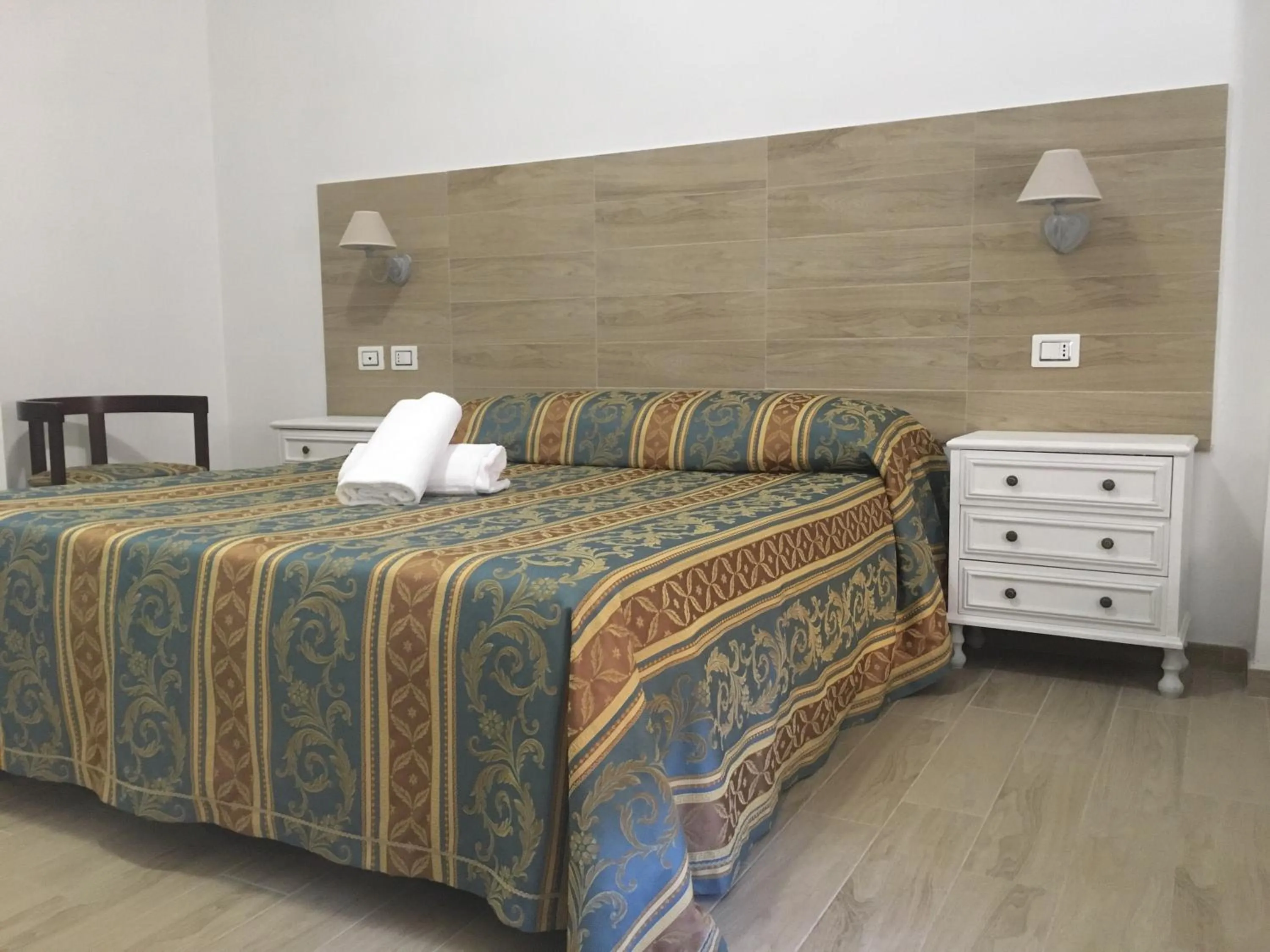 Bedroom in Hotel La Bussola