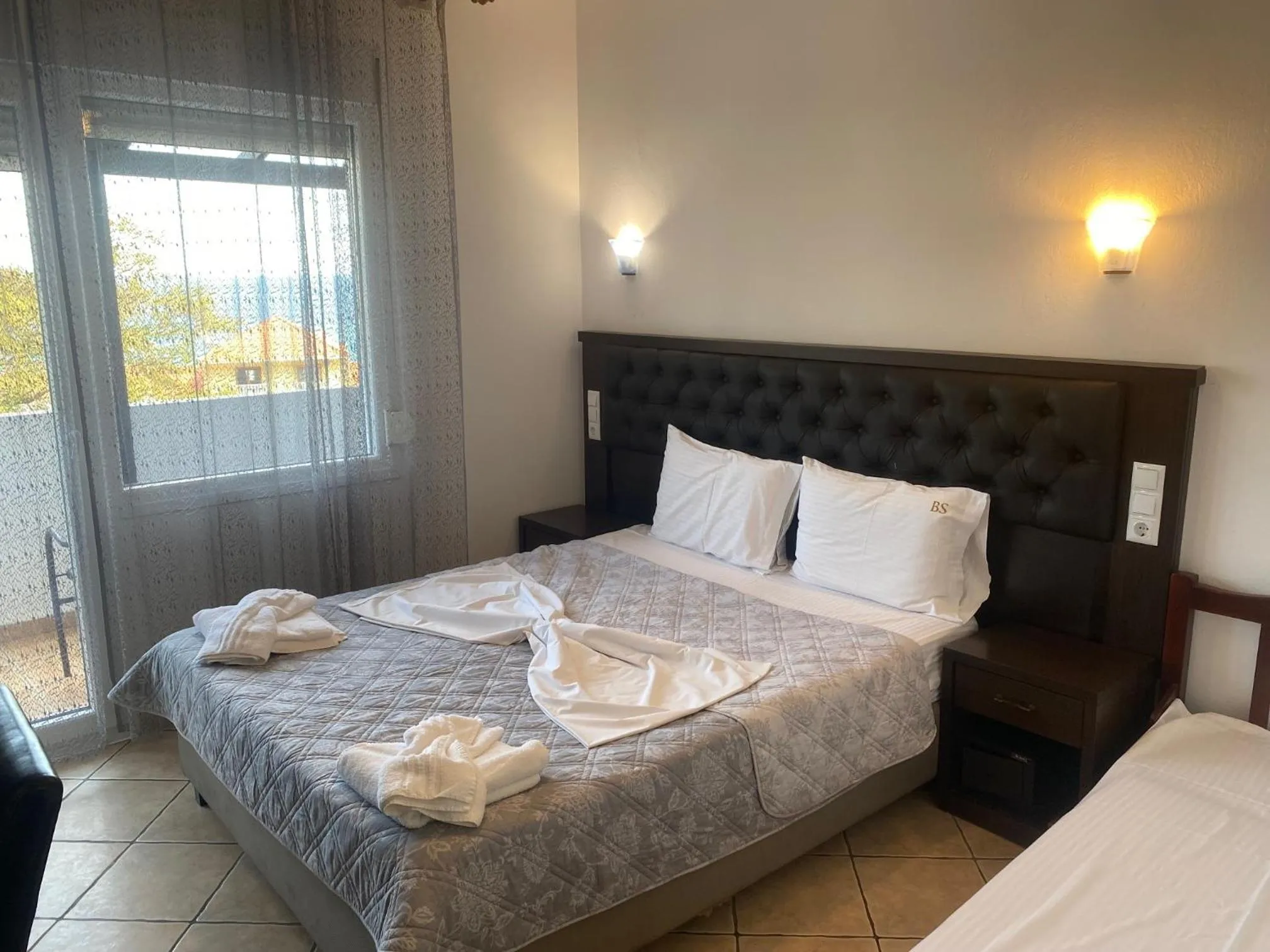 Bed in Blue Bay Beach Hotel