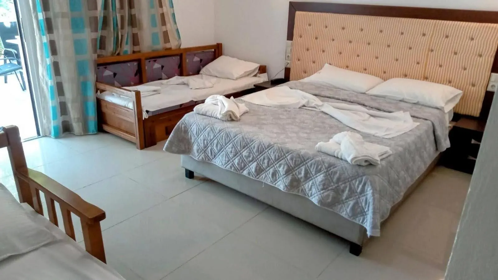 Bed in Blue Bay Beach Hotel