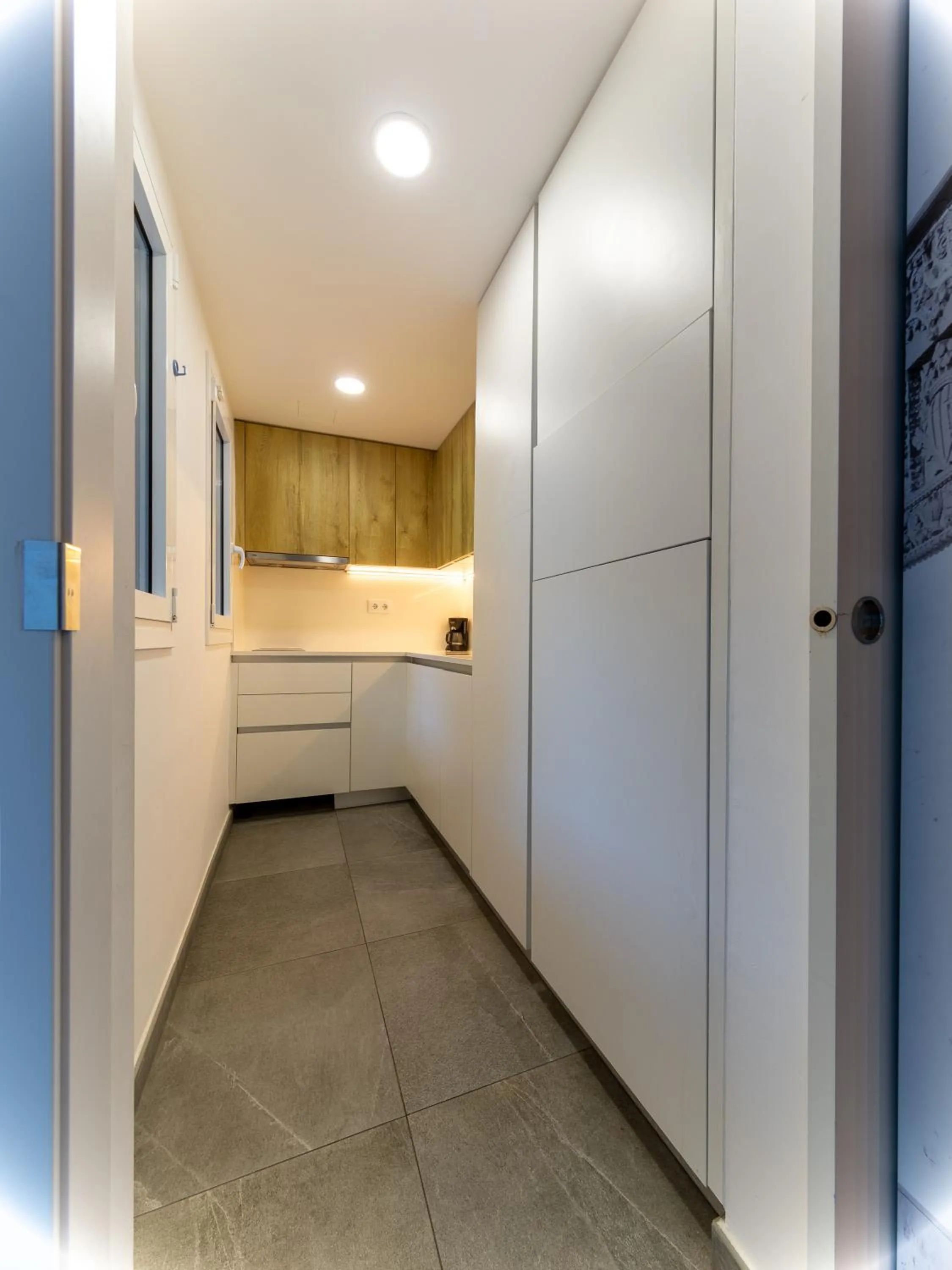 Kitchen or kitchenette in Apartamentos Sunway Apollo