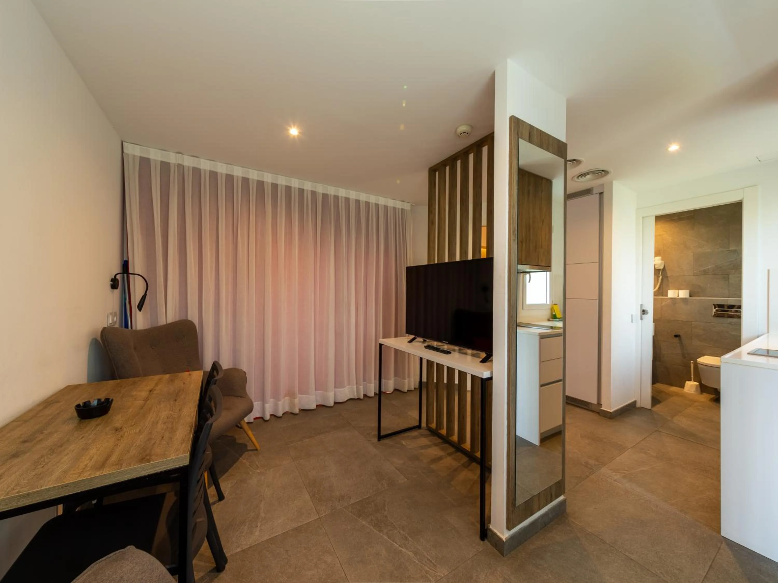 TV and multimedia in Apartamentos Sunway Apollo