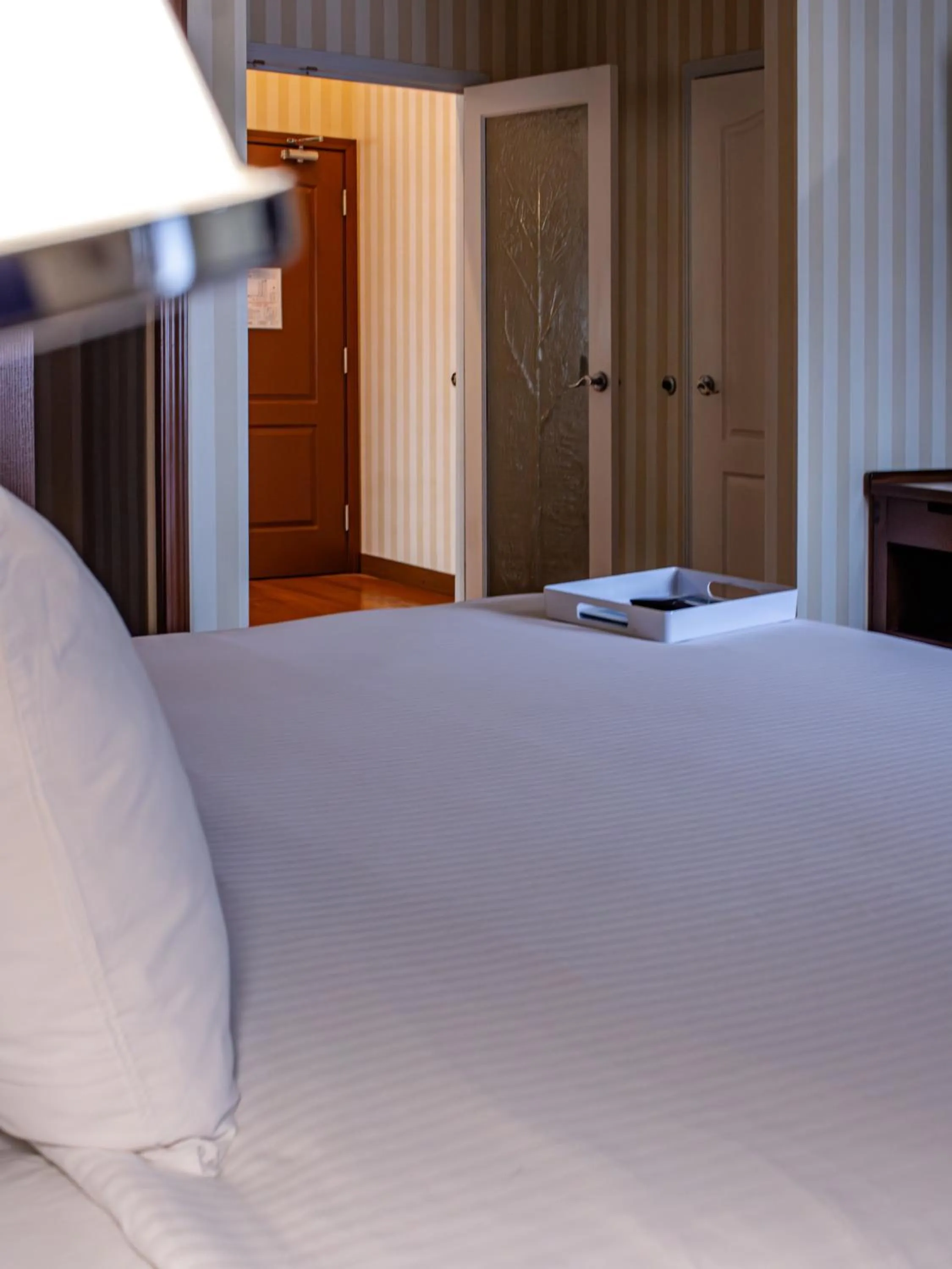 Bed in Prestige Prince George Lodge