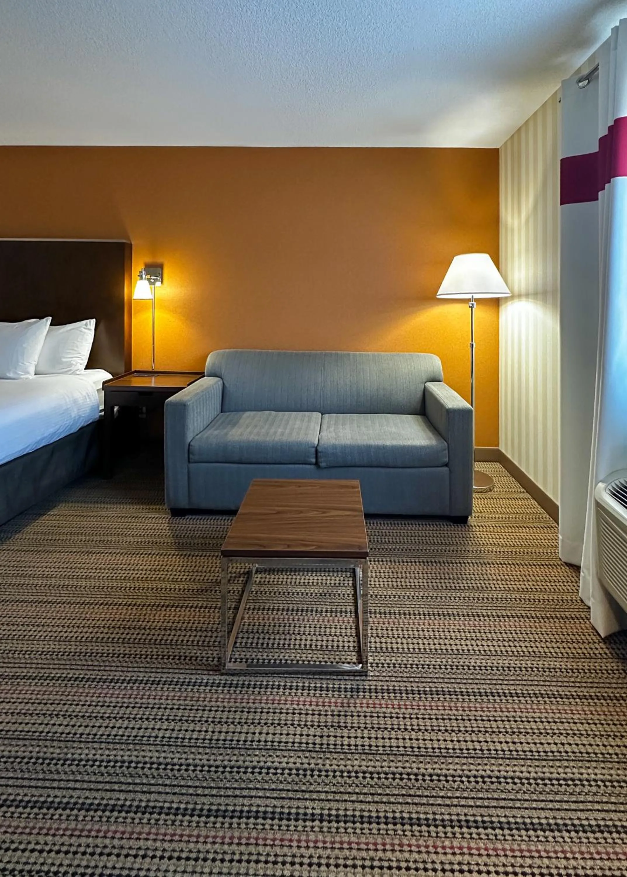 Bed in Prestige Prince George Lodge