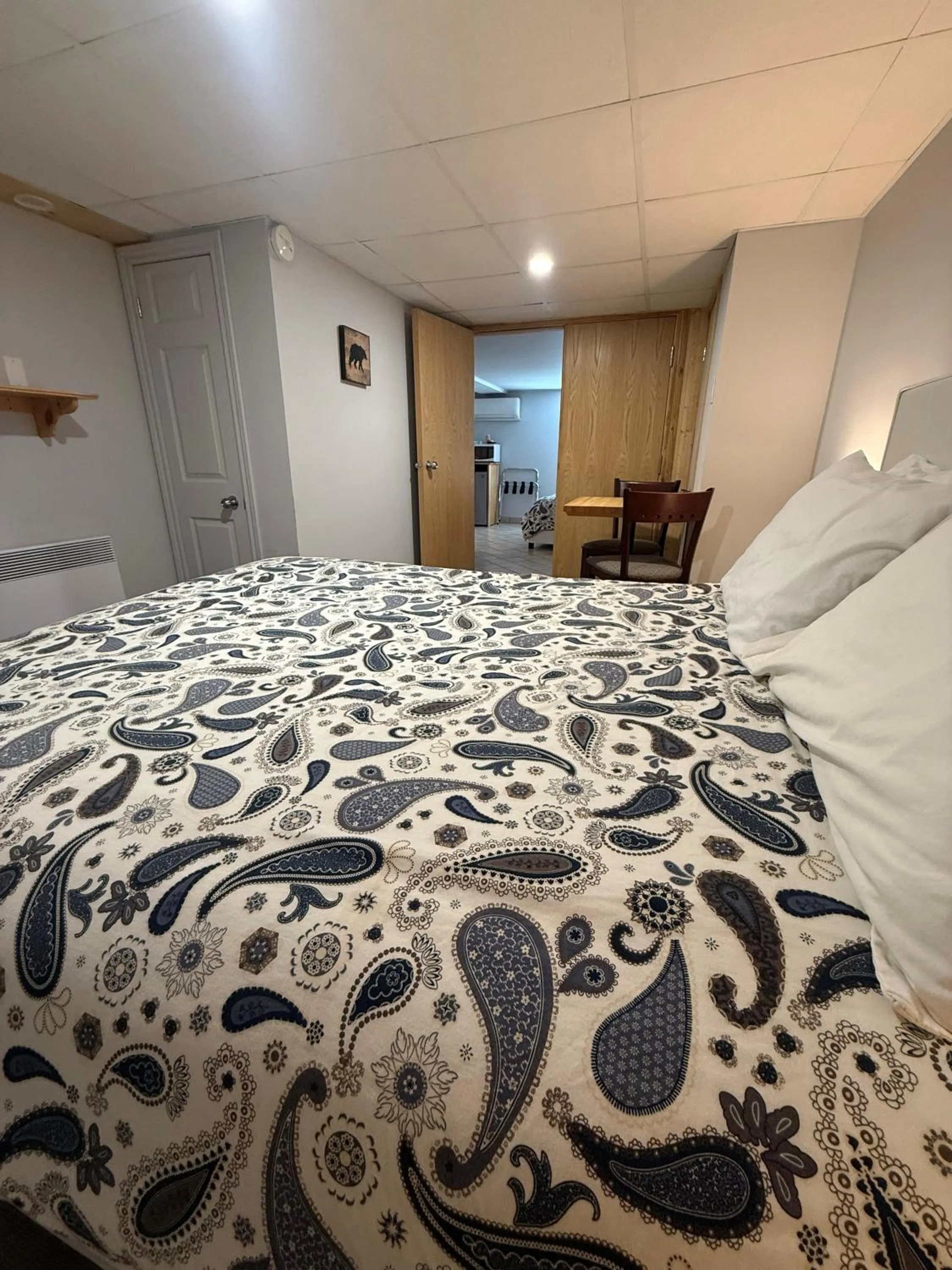 Bed in La Galouine Auberge