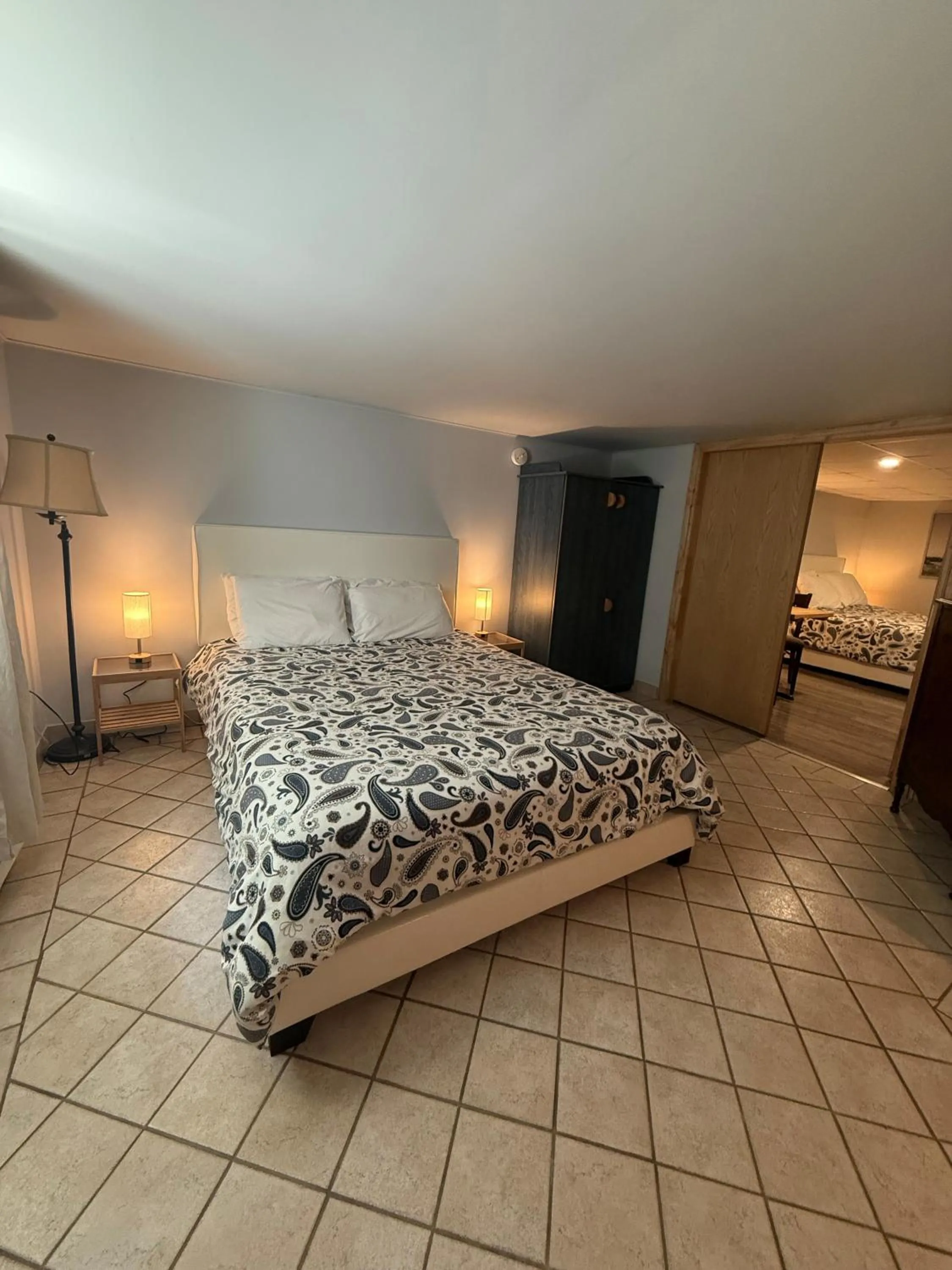 Bed in La Galouine Auberge