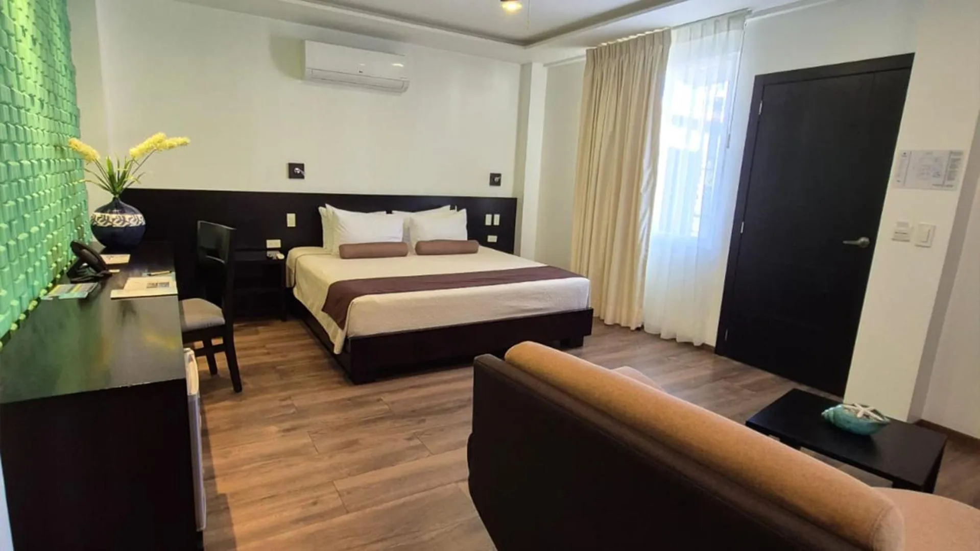 Bed in Ikala Galapagos Hotel