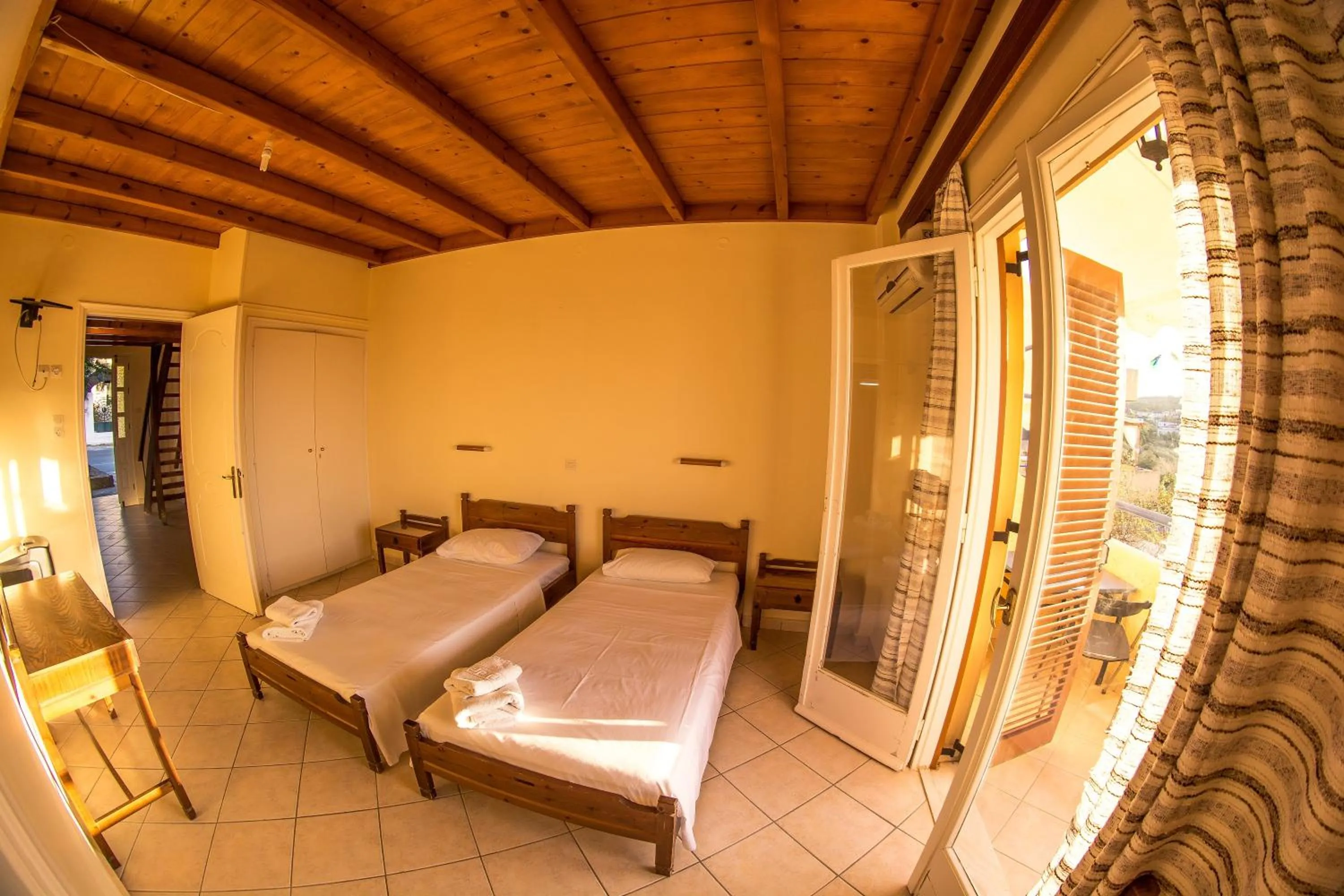 Bed in Vagia Beach Apartments, Aegina Island