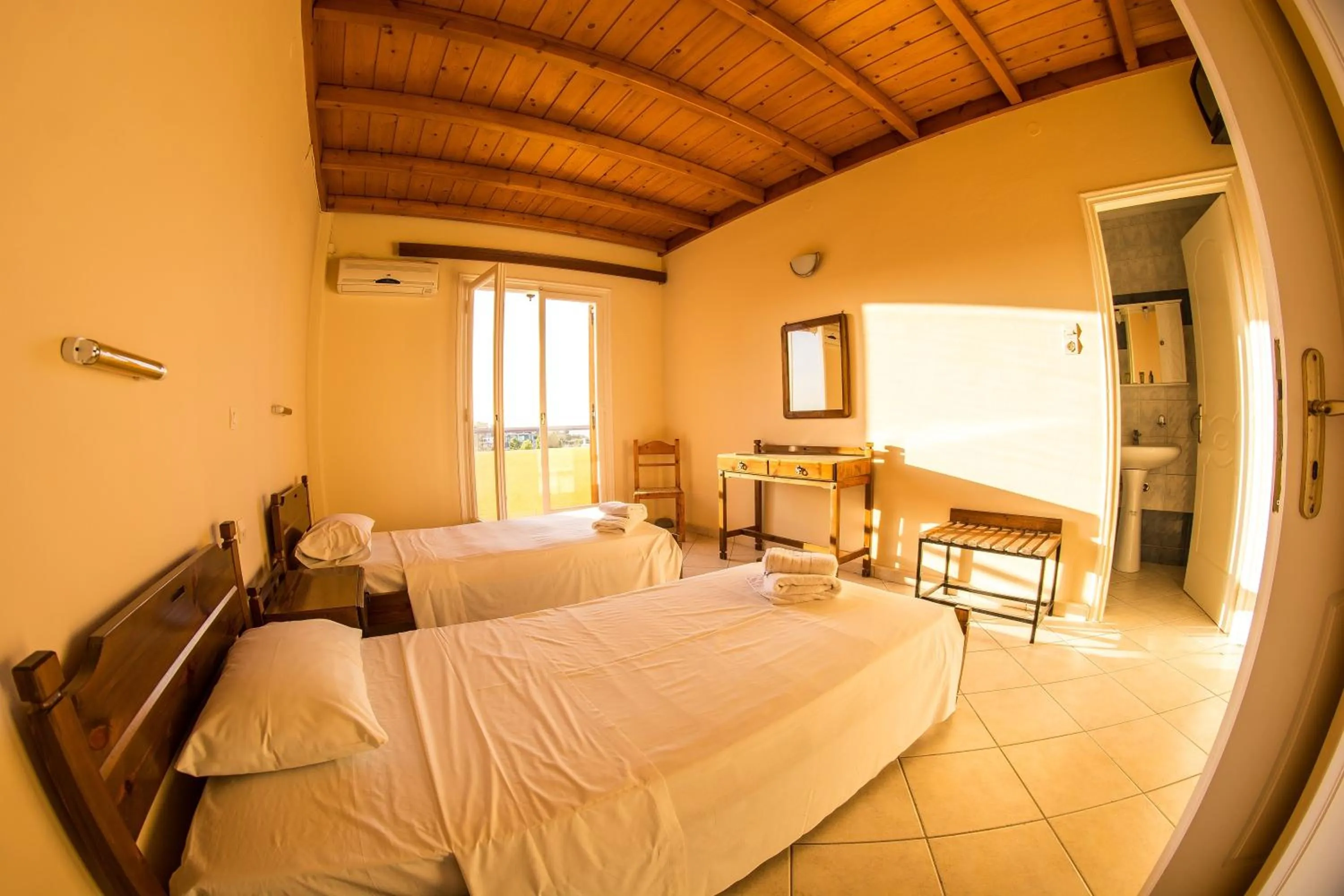 Bedroom, Bed in Vagia Beach Apartments, Aegina Island