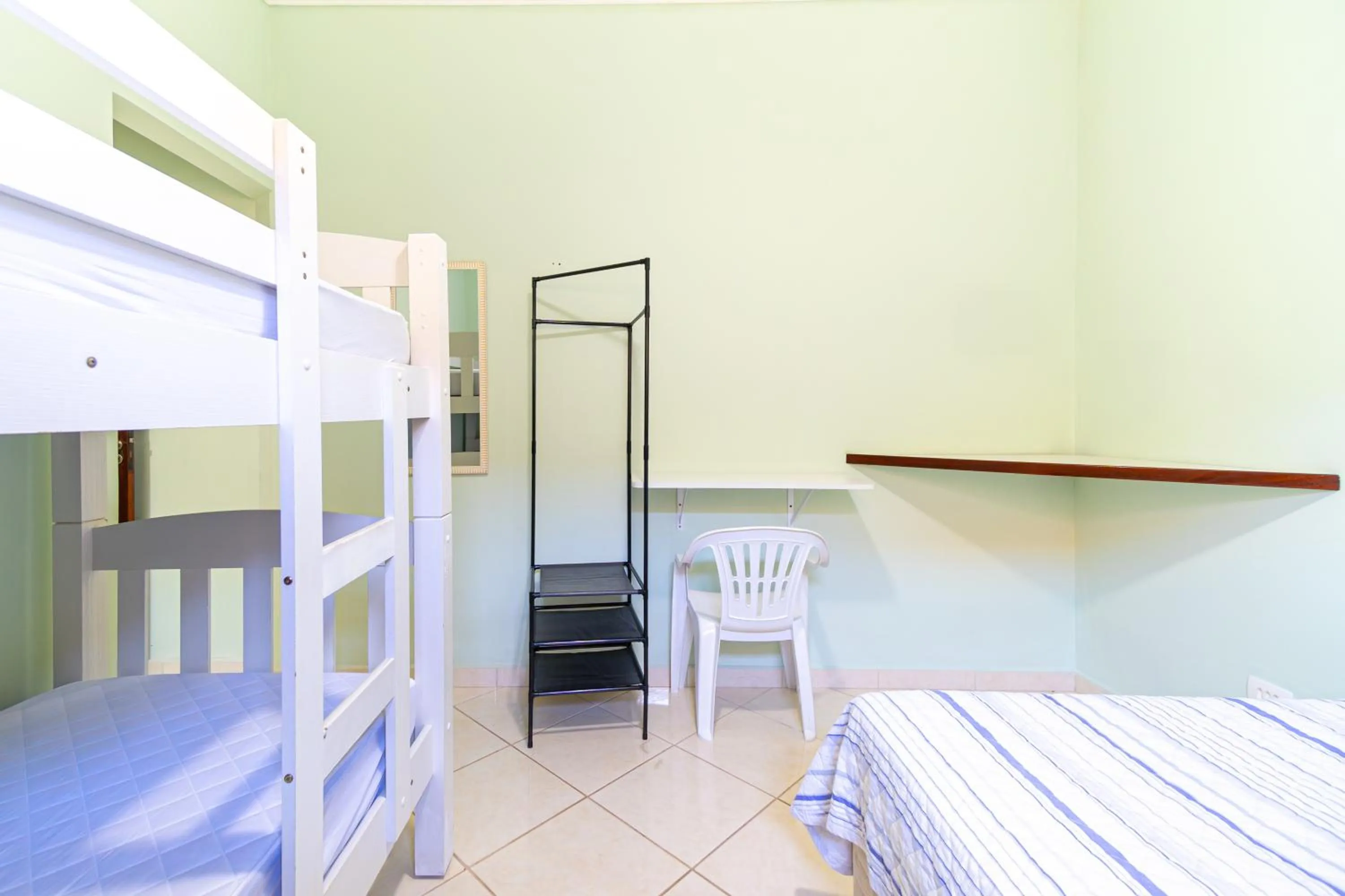 Bed in Casa Gomes no Point de Itaguá