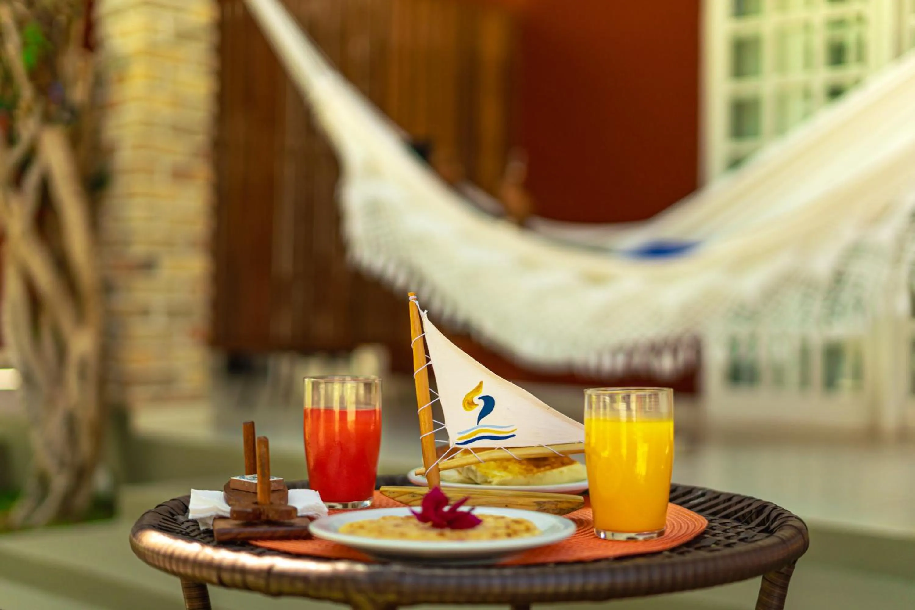 Food and drinks in Pousada Arte do Velejo by Solarium