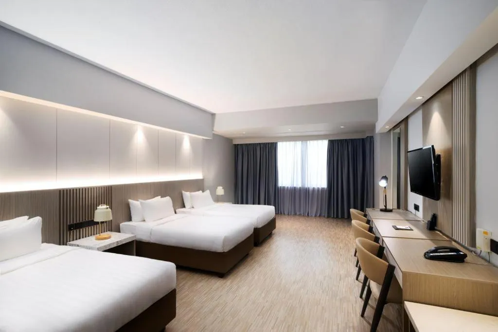 Bed in RELC International Hotel