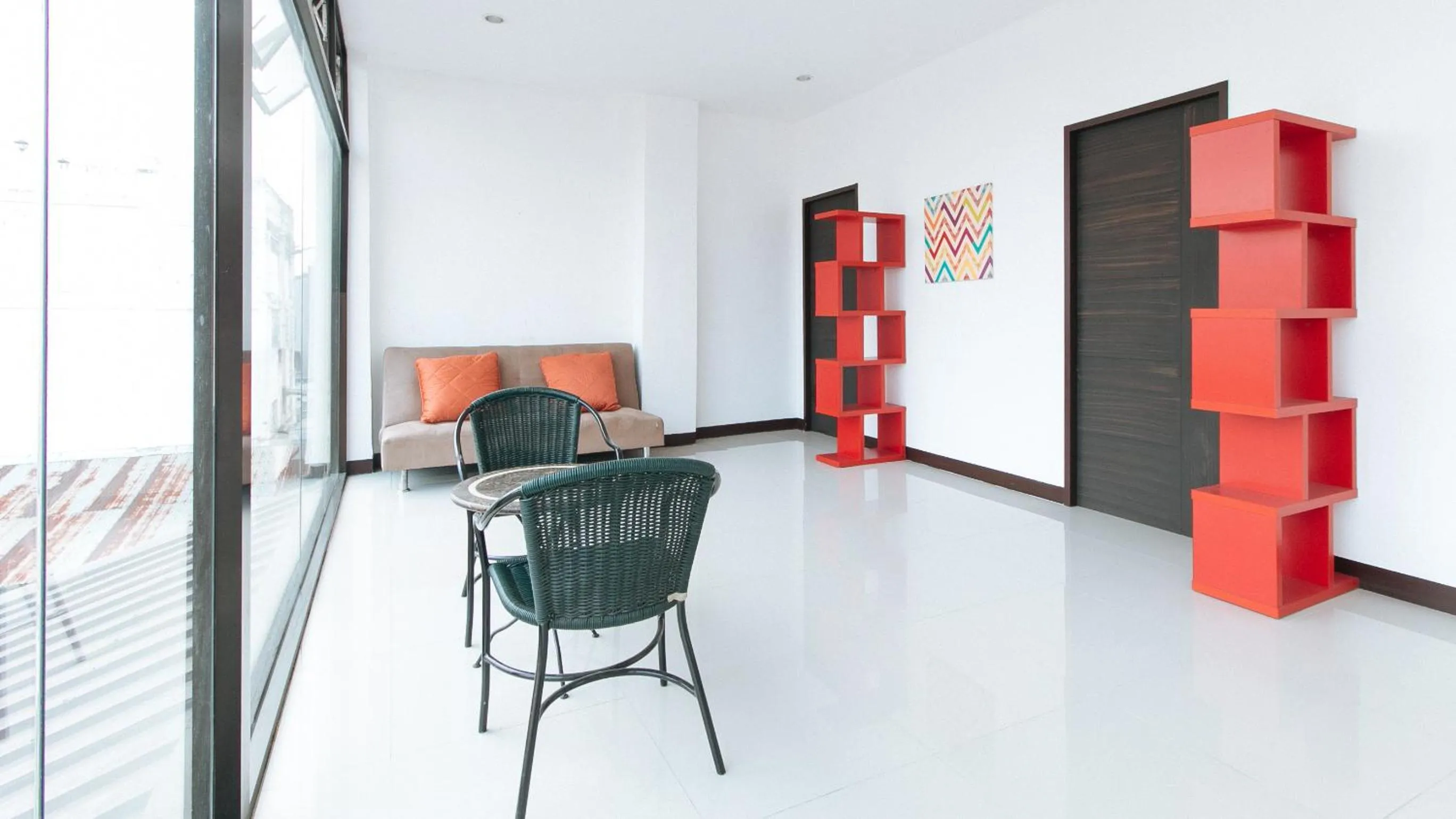 Seating area in RedDoorz at San Antonio Makati