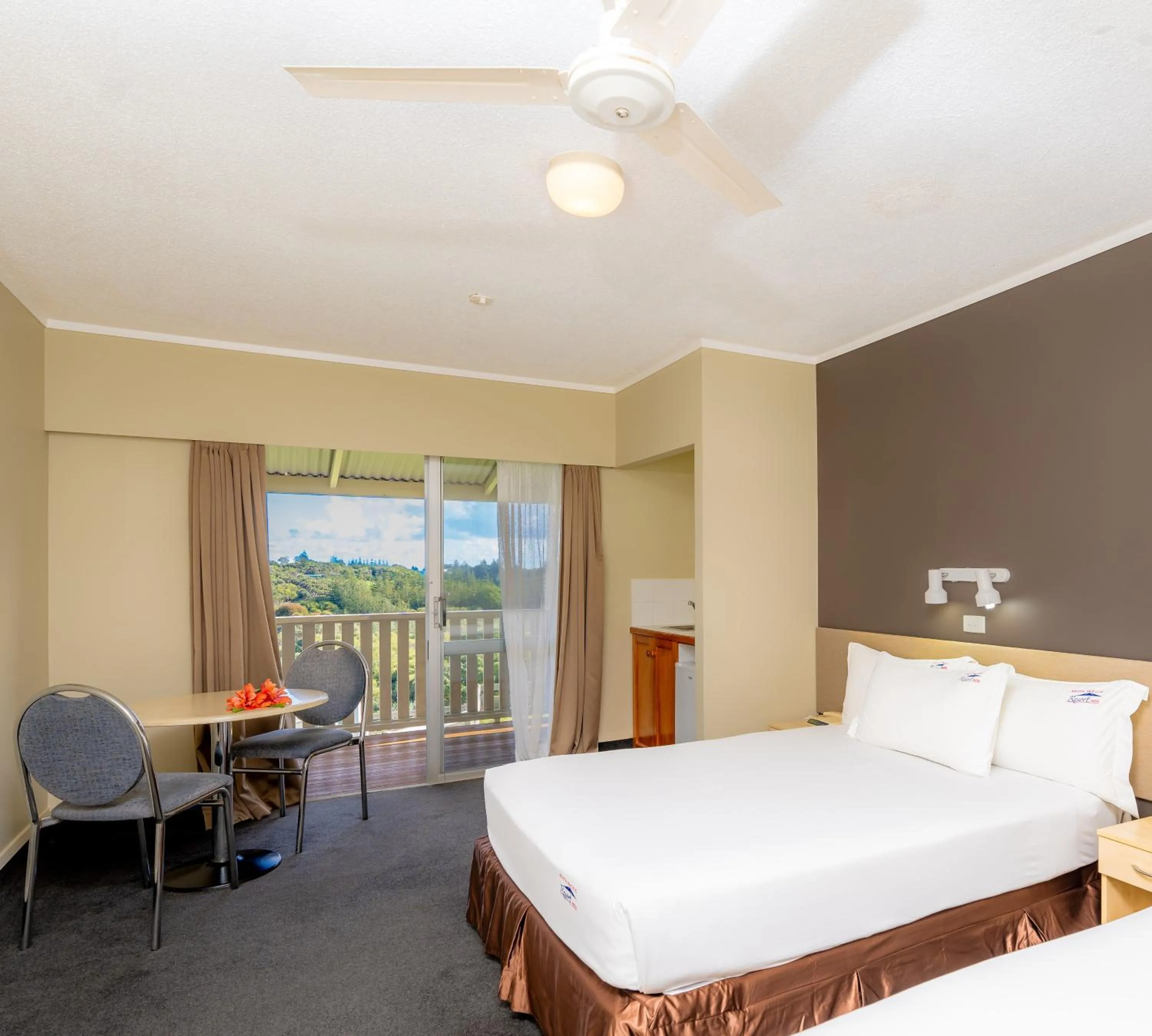 Bed in South Pacific Resort Hotel