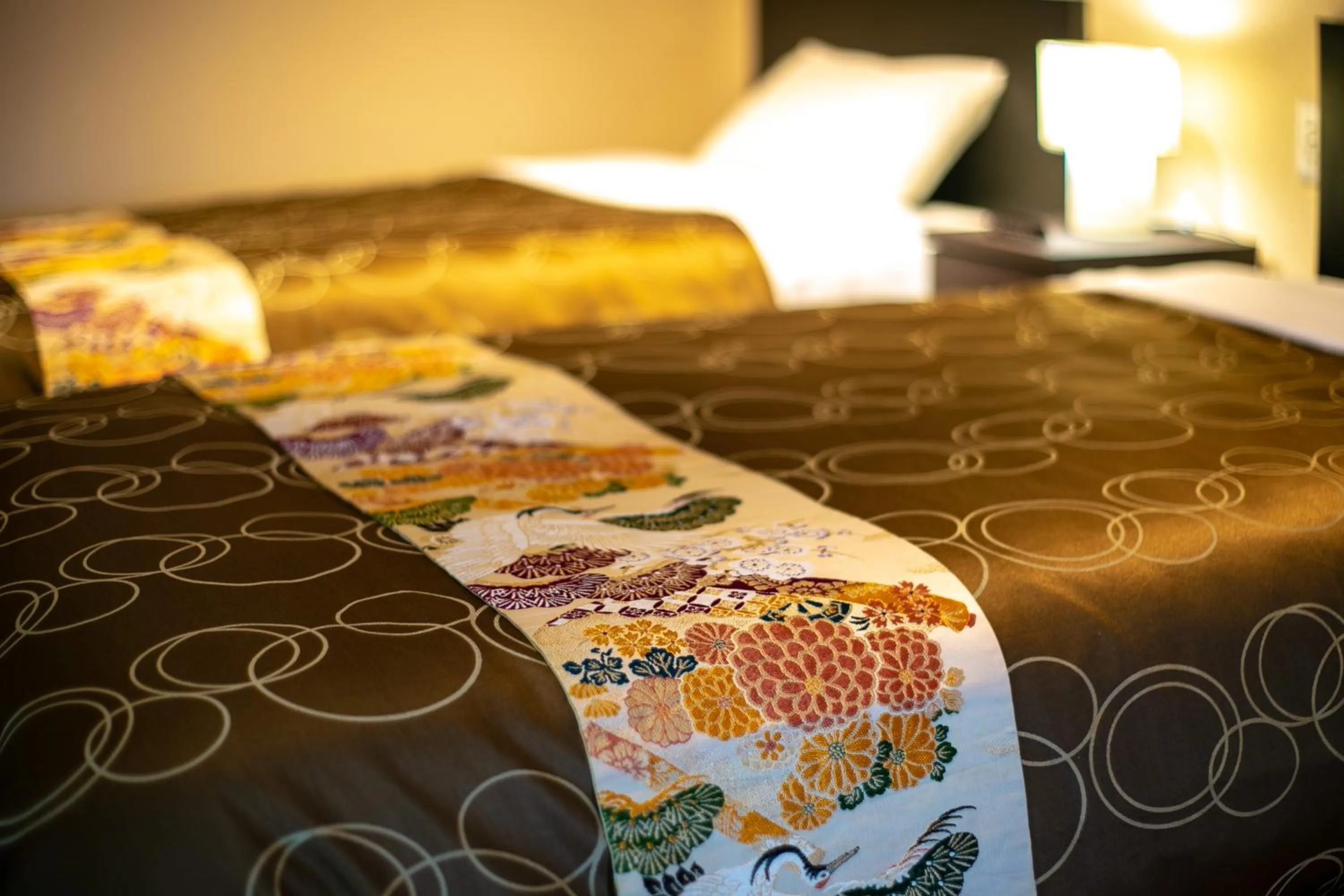 Decorative detail, Bed in Yufuin Lamp no Yado