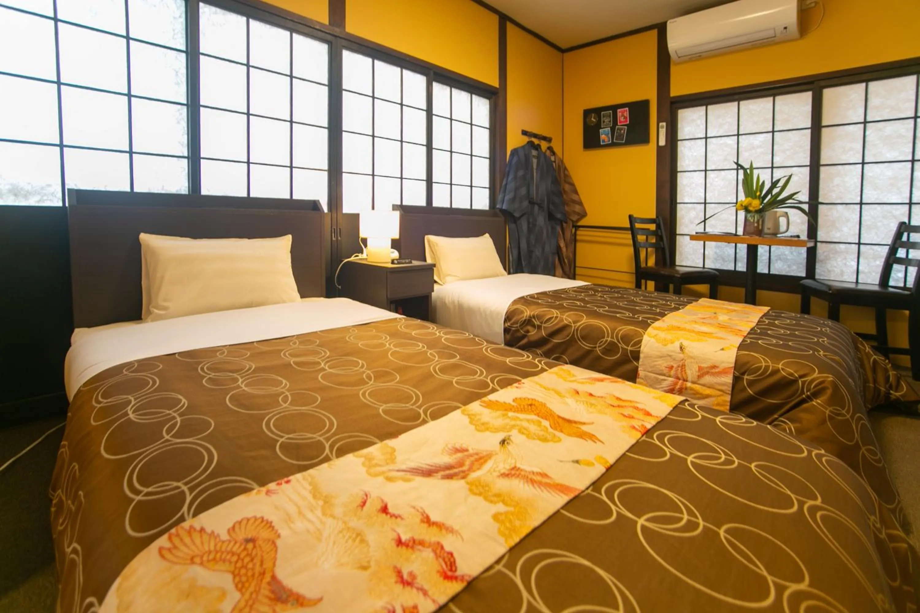 Bed in Yufuin Lamp no Yado