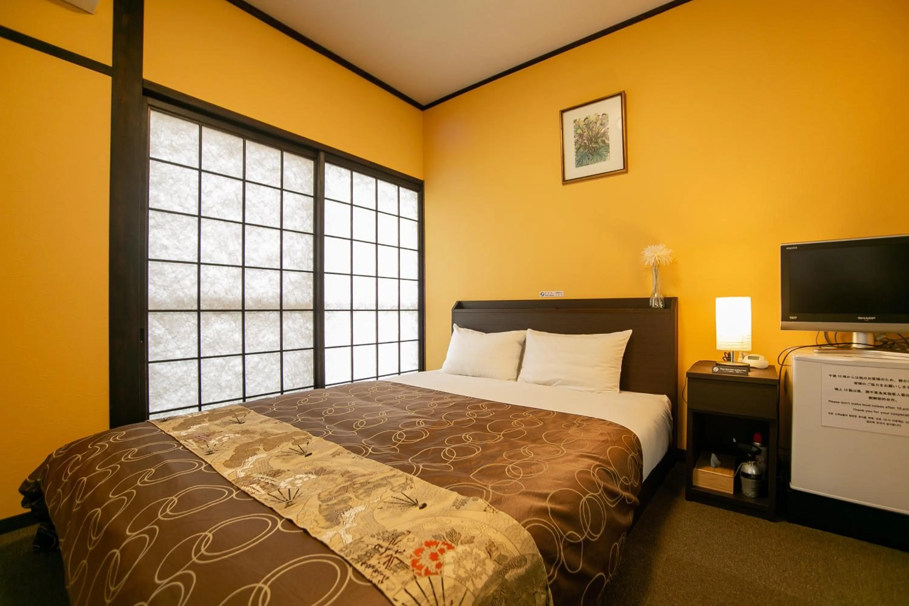 Bed in Yufuin Lamp no Yado