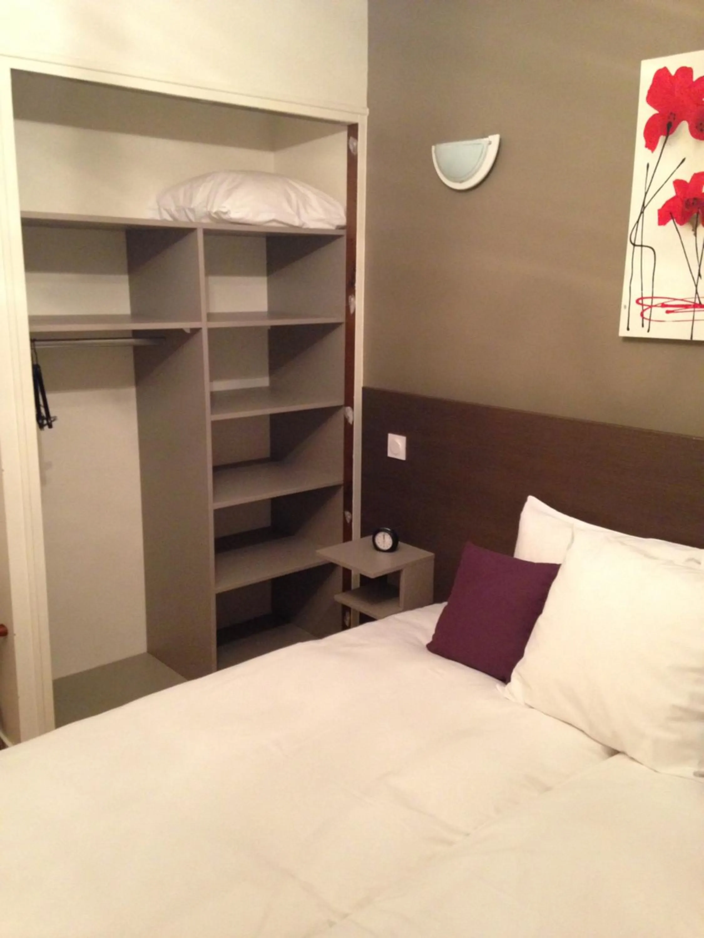 Bedroom in Logis Hôtel Restaurant La Bastide