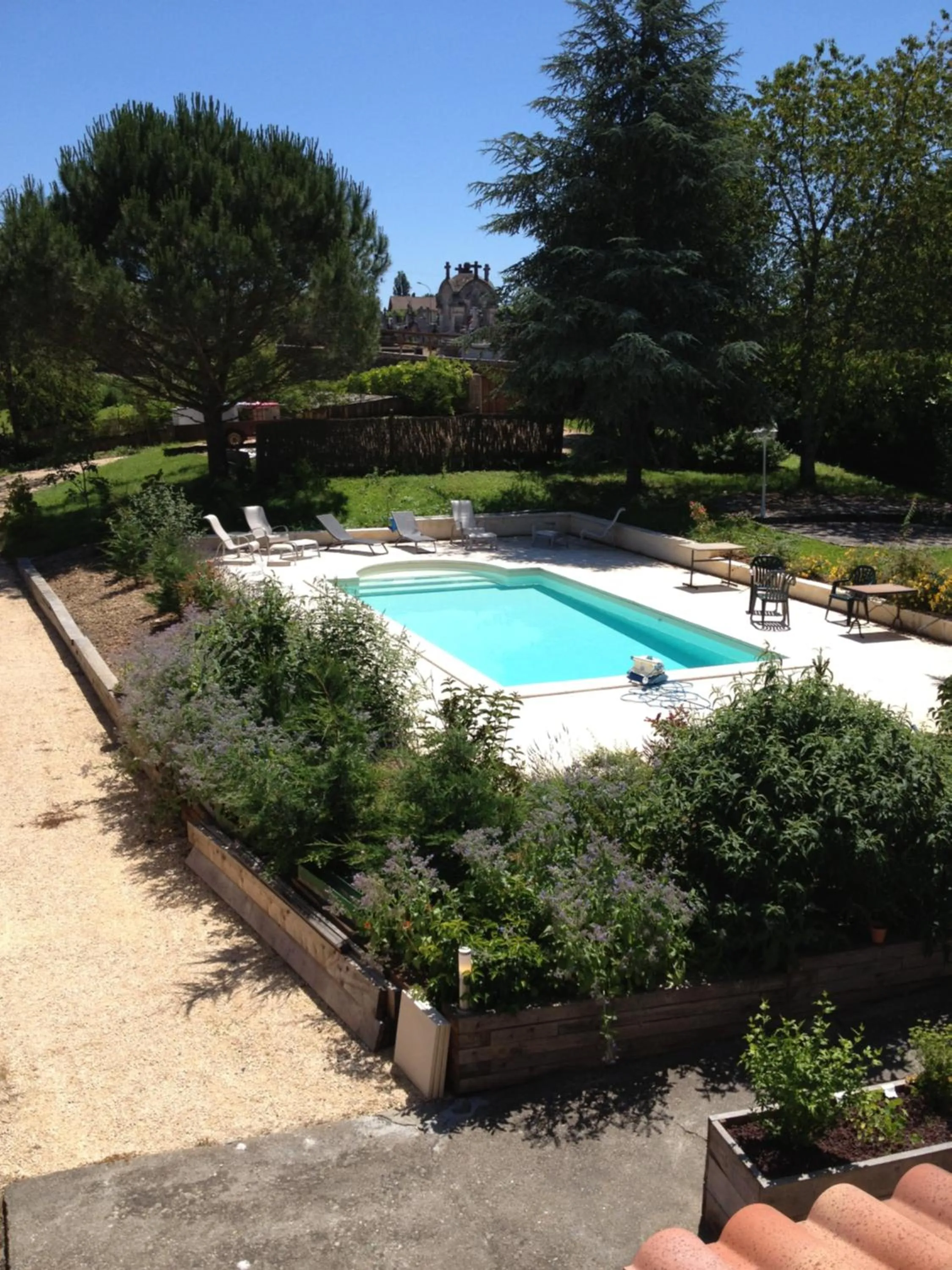 Garden in Logis Hôtel Restaurant La Bastide