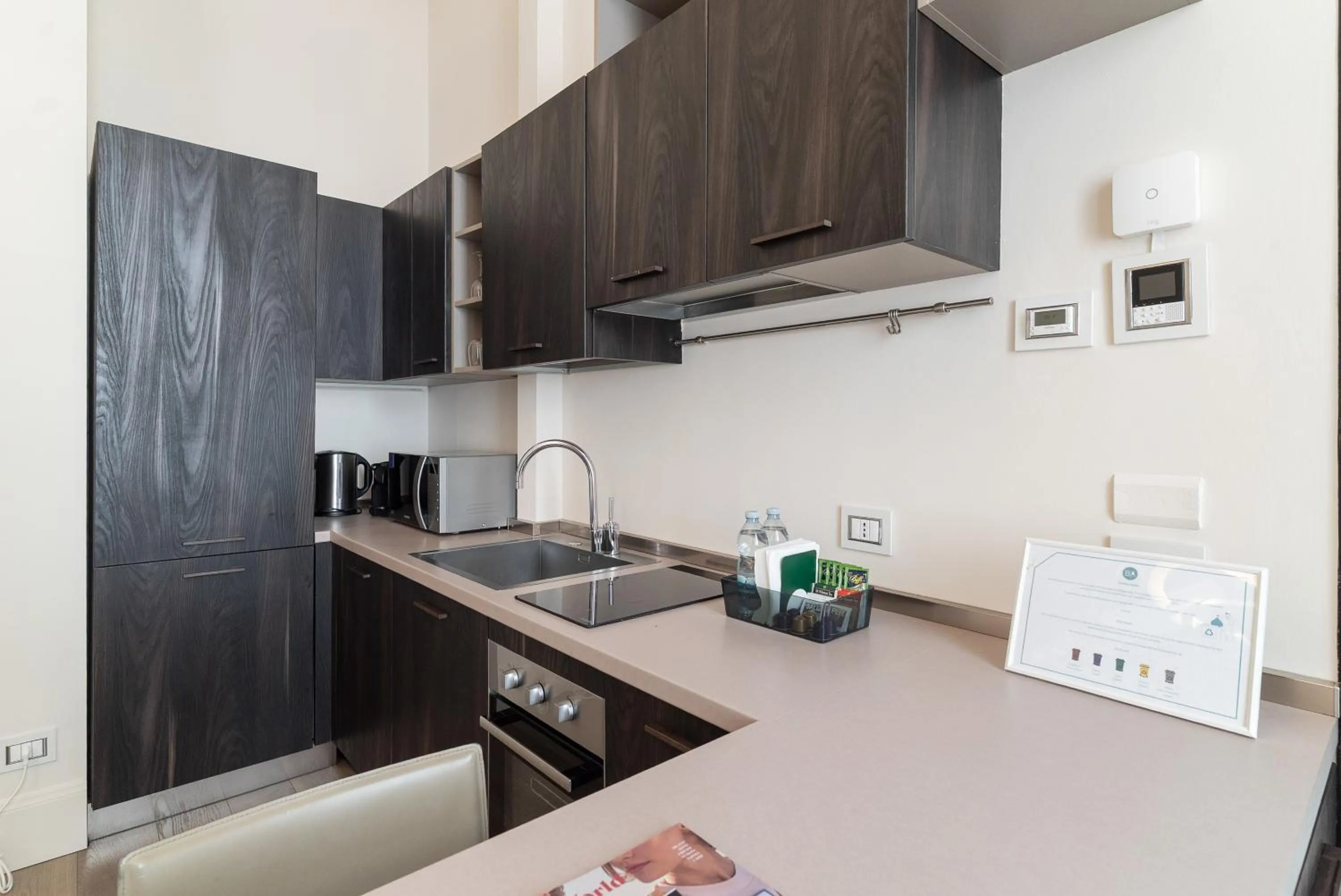 Kitchen or kitchenette in Brera Apartments in City Center
