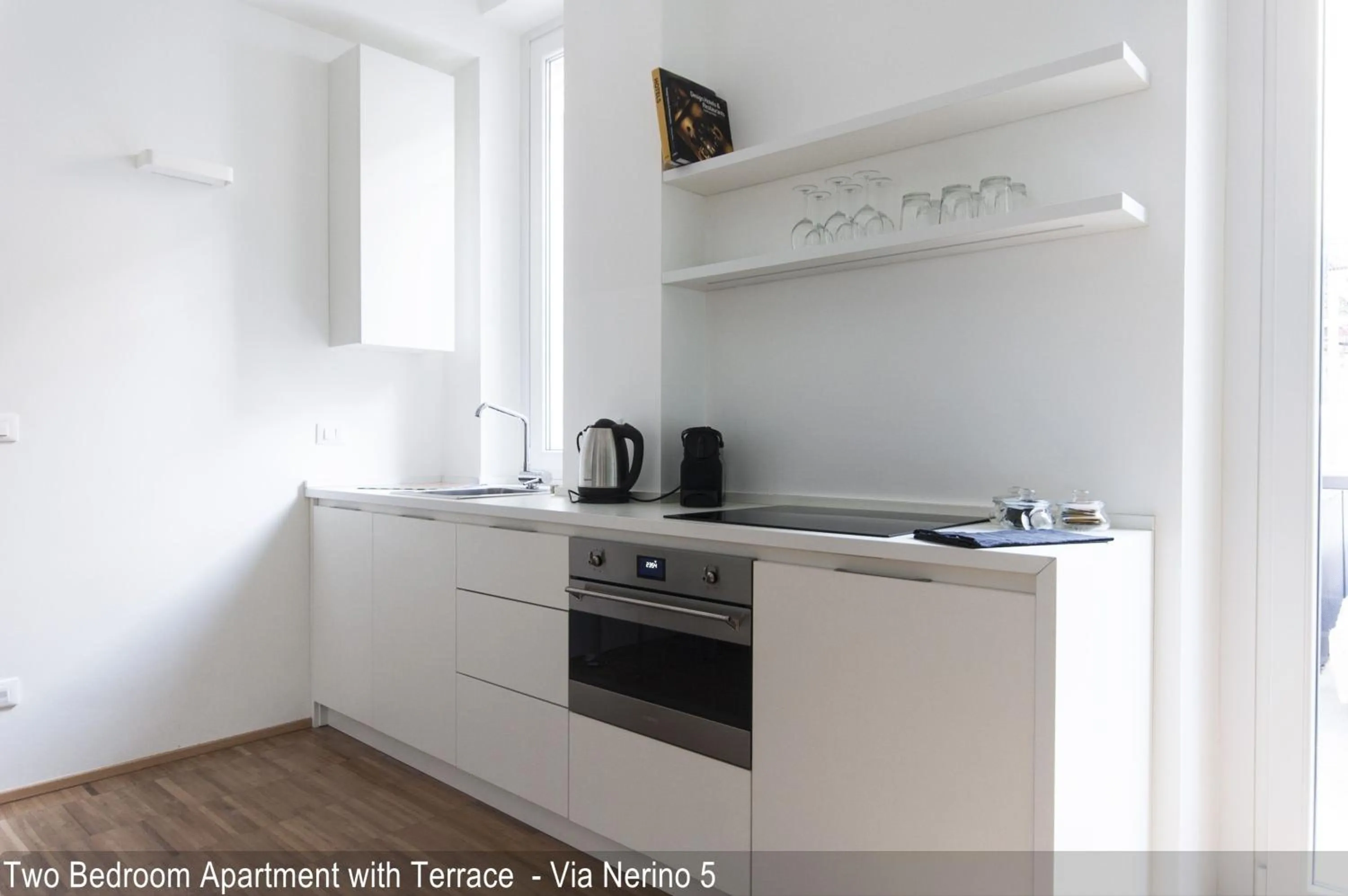 Kitchen or kitchenette in Brera Apartments in City Center