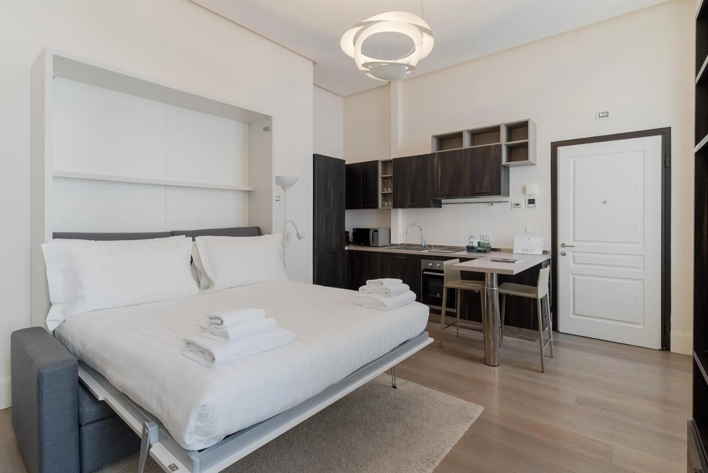 Photo of the whole room, Bed in Brera Apartments in City Center