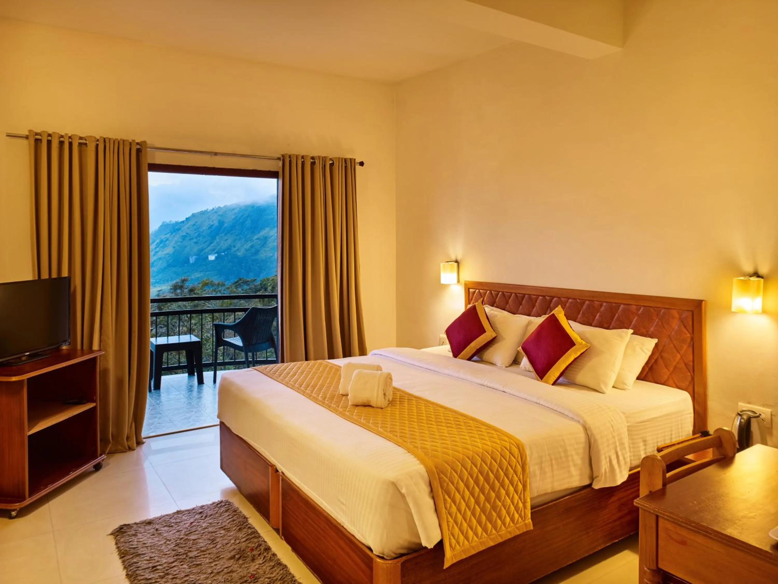 Bed in Deshadan Mountain Resort -The highest resort in Munnar